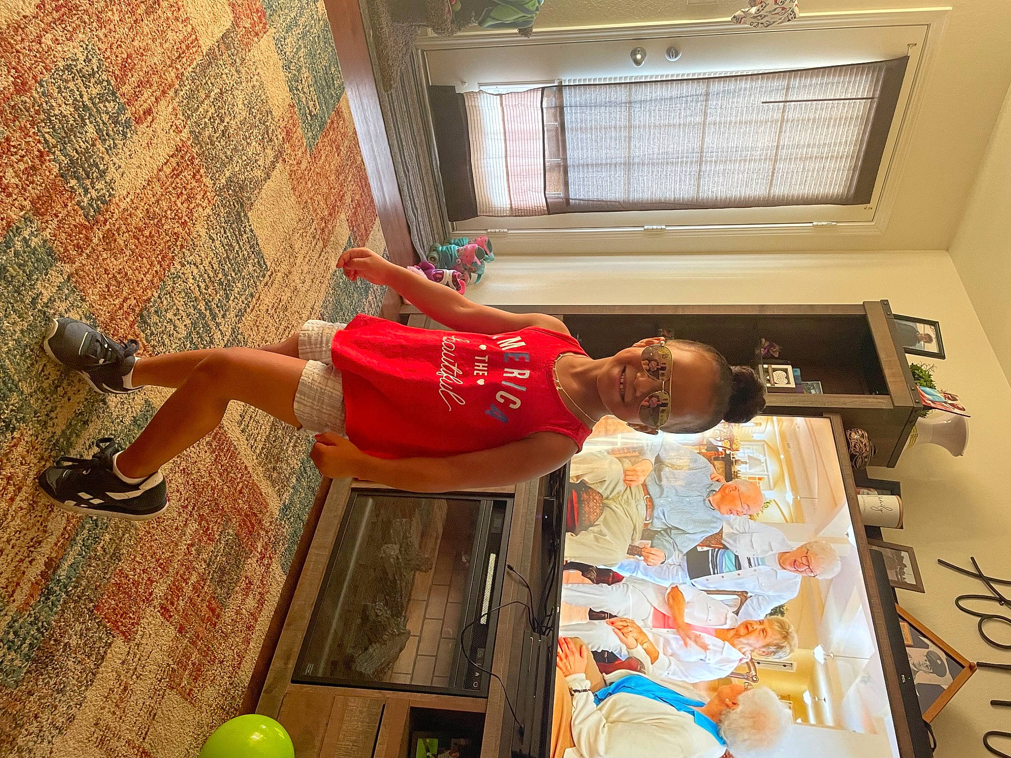 Realynn joined the competition — help win amazing prizes! ball, calf, child, flooring, foot, fun, human_leg, joy, knee, leg, leisure, person, room, sandal, shorts, t_shirt, thigh, visual_arts, waist, window