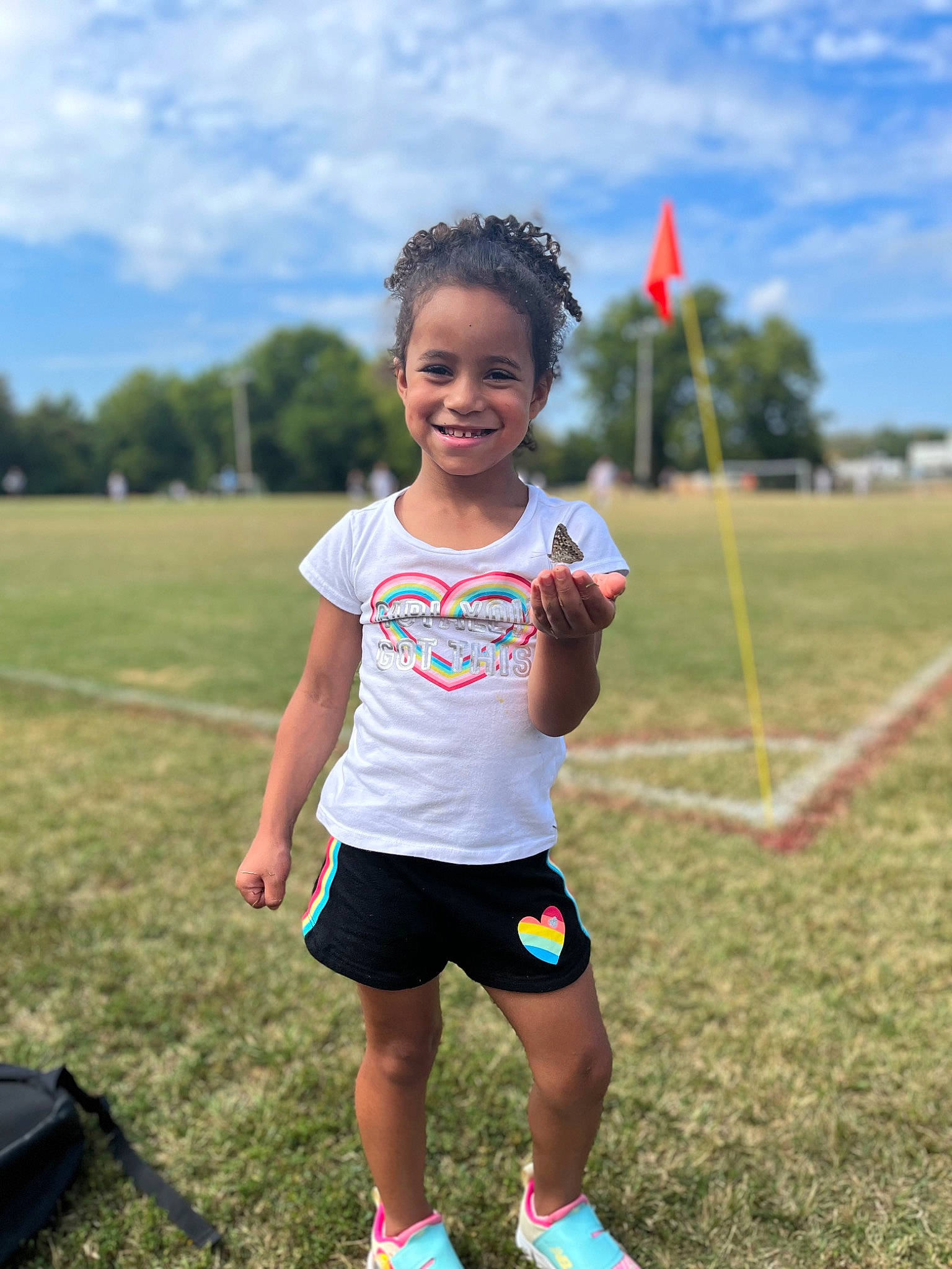 Realynn is registered to the contest to win money with this photo: athlete, child, cloud, competition_event, fun, grass, grassland, happy, joy, knee, leisure, person, recreation, shorts, sky, smile, sports, summer, t_shirt, thigh