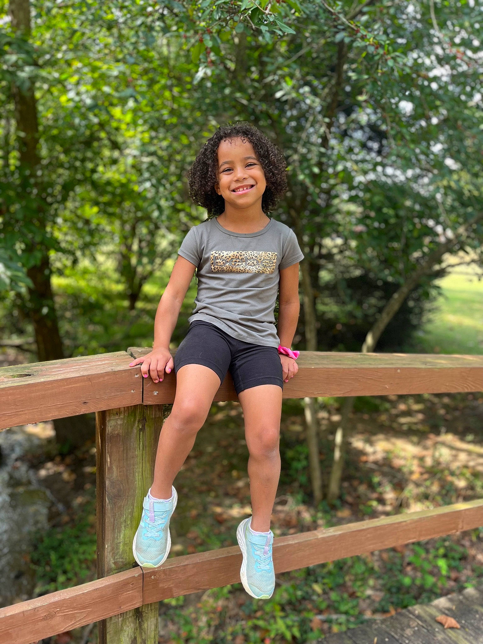 Realynn is registered to the contest to win money with this photo: child, electric_blue, fun, grass, happy, human_leg, joy, knee, leg, leisure, people_in_nature, person, plant, recreation, shorts, sitting, smile, t_shirt, thigh, toddler