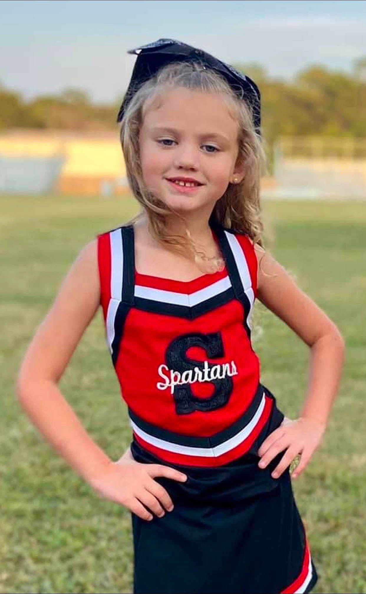 Tegan joined the competition — help win amazing prizes! active_tank, athlete, brown_hair, eye, face, grass, hair, happy, joy, pattern, person, player, recreation, sky, smile, sports, sports_uniform, sportswear, team_sport, toddler