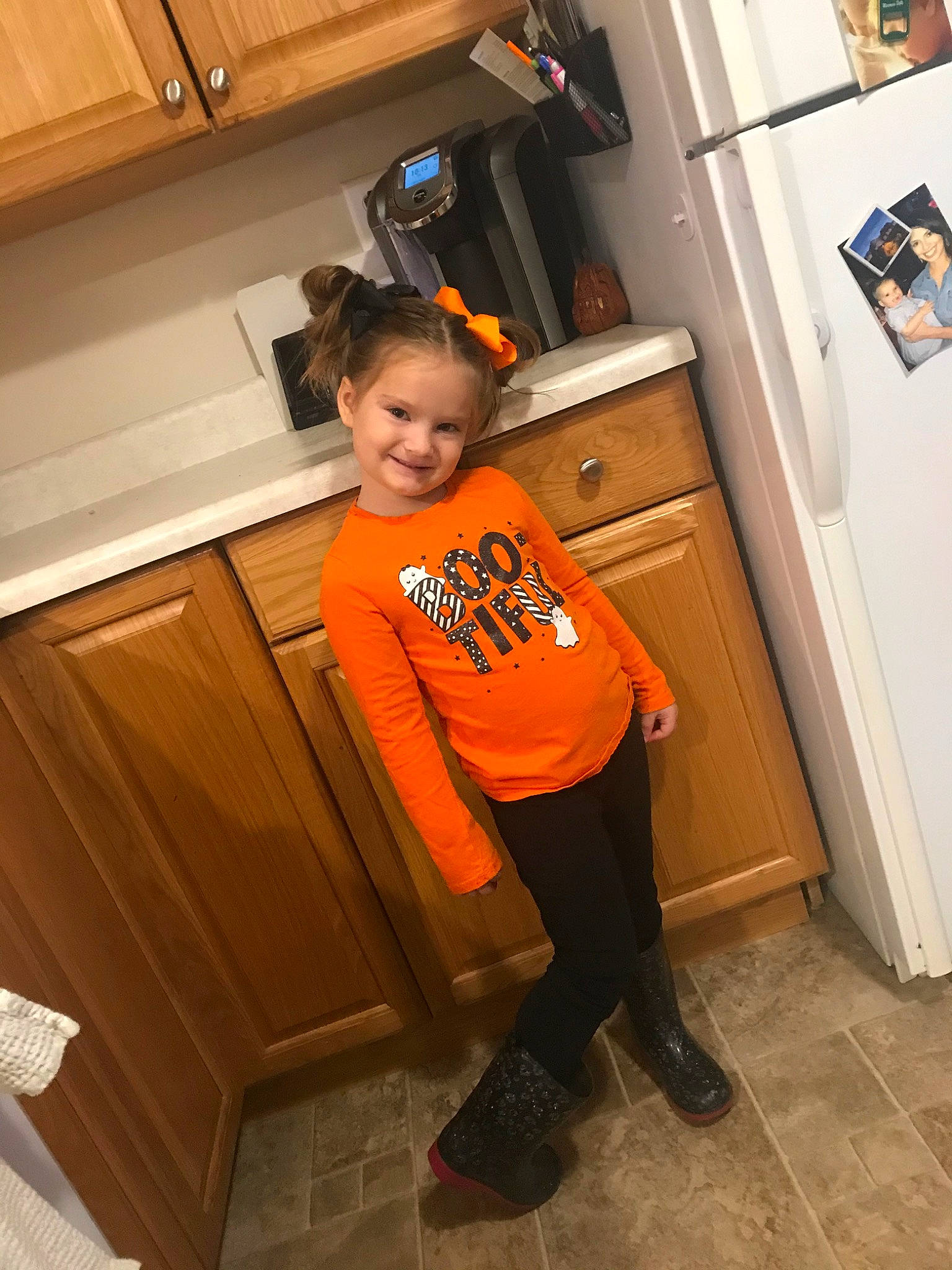 Myra is registered to the contest to win money with this photo: child, door, floor, flooring, joy, person, room, shoulder, standing, t_shirt, toddler