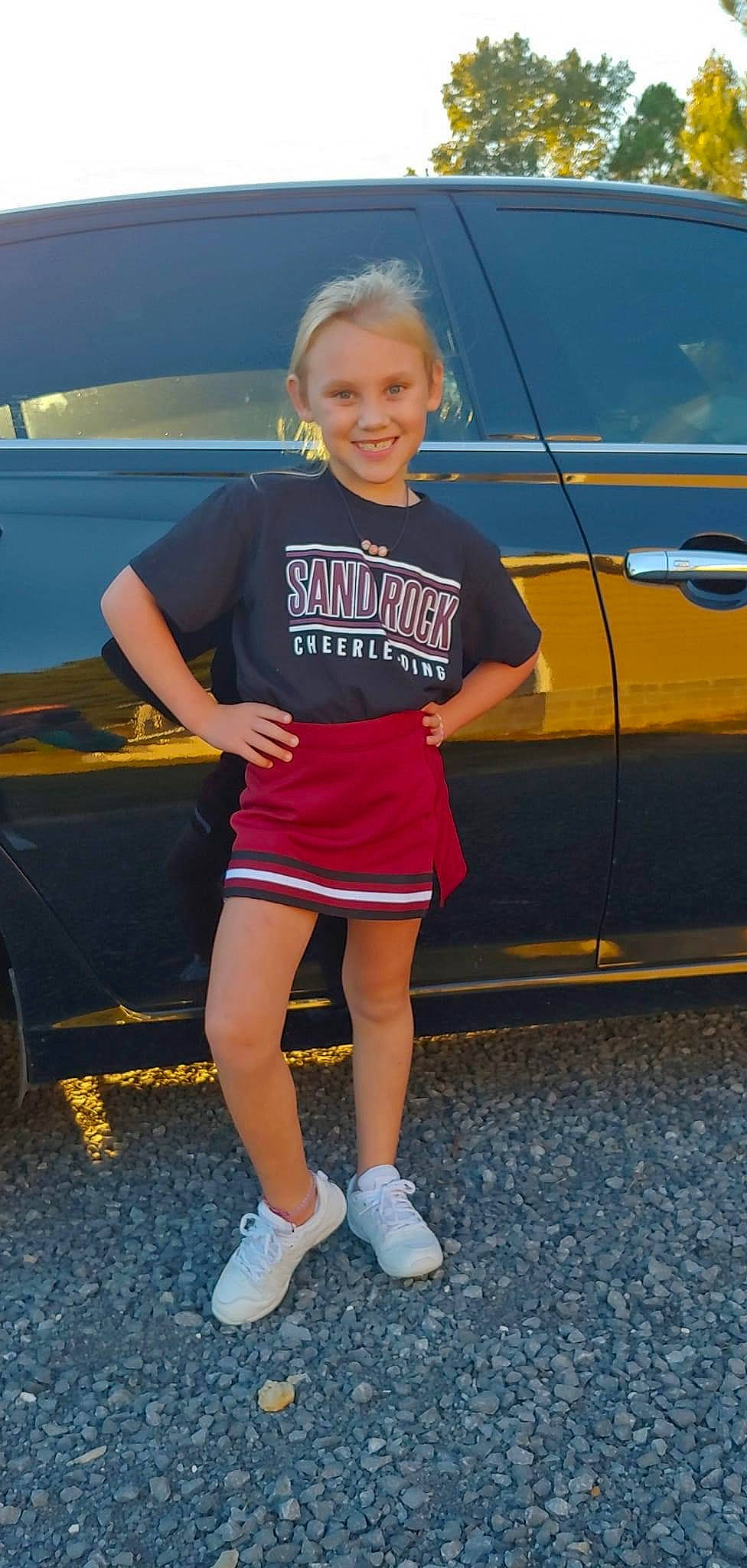 Annistyn is registered to the contest to win money with this photo: automotive_design, automotive_exterior, automotive_lighting, automotive_tire, automotive_wheel_system, bumper, car, hood, joy, leg, motor_vehicle, person, personal_luxury_car, rim, shoe, smile, sneakers, thigh, tire, vehicle