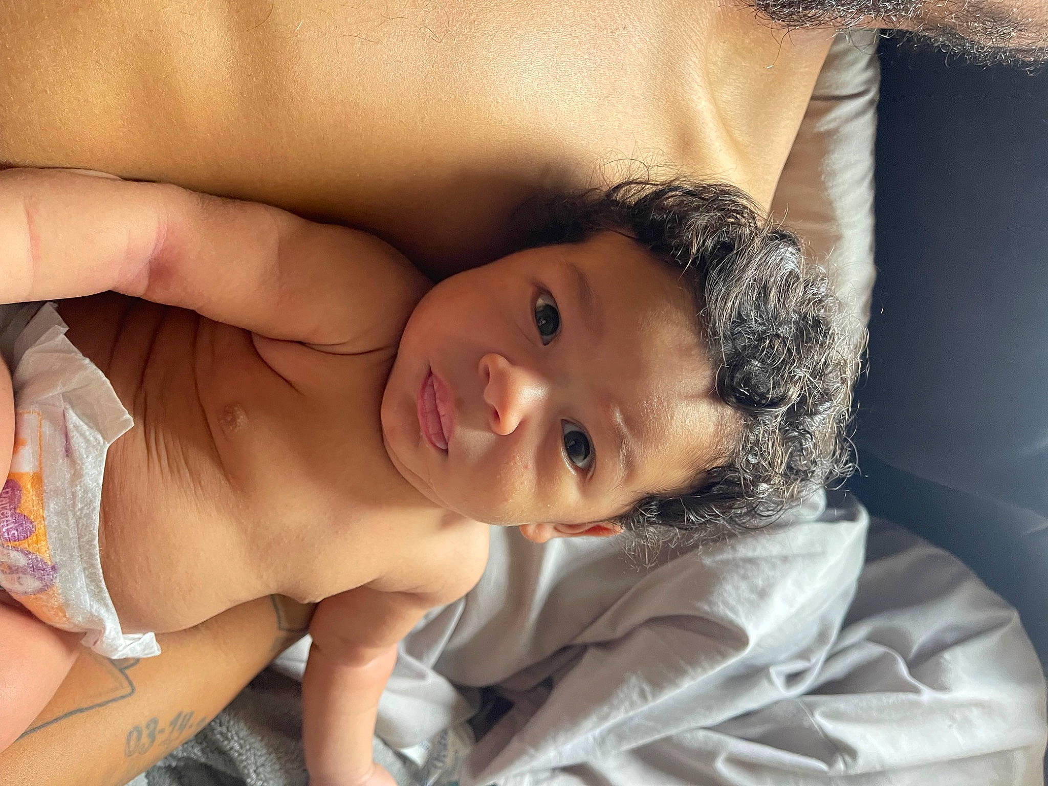 Izaiah joined the competition — help win amazing prizes! abdomen, baby, barechested, cheek, chest, comfort, eyelash, flash_photography, happy, head, linens, nose, person, skin, smile, stomach, textile, thigh, thumb, toddler