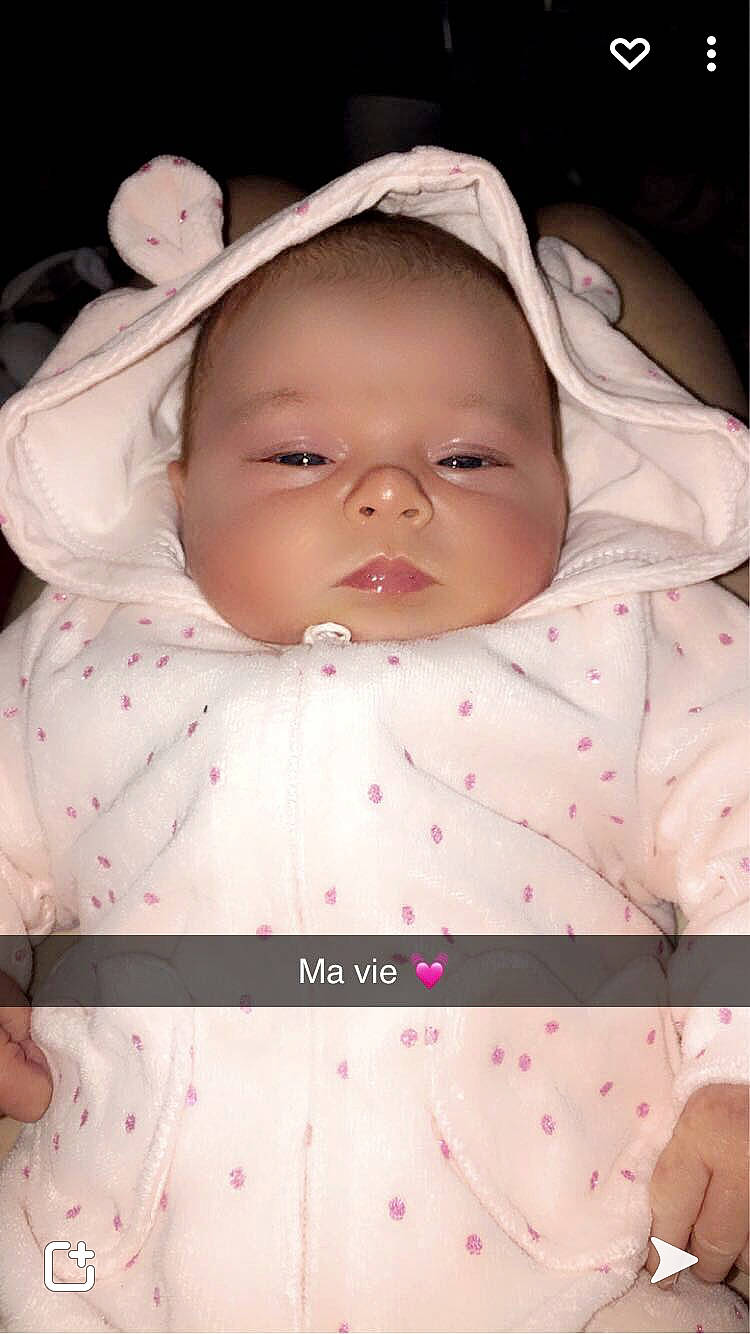 Lila participe au concours pour gagner de l'argent avec cette photo : baby, baby_products, baby_toddler_clothing, cheek, child, chin, comfort, eye, eyebrow, happy, iris, lip, nose, pattern, person, pink, skin, sleeve, textile, toddler