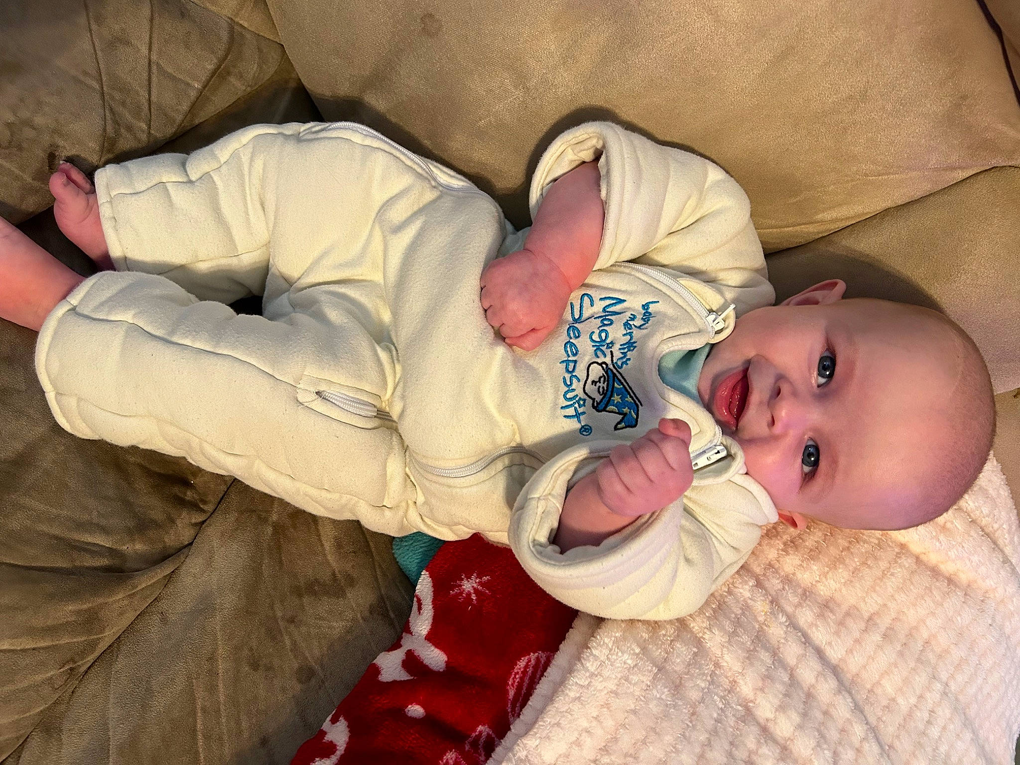Easton joined the competition — help win amazing prizes! baby, baby_products, baby_toddler_clothing, cheek, child, comfort, human_body, mammal, mouth, nap, person, room, sitting, skin, sleep, smile, toddler
