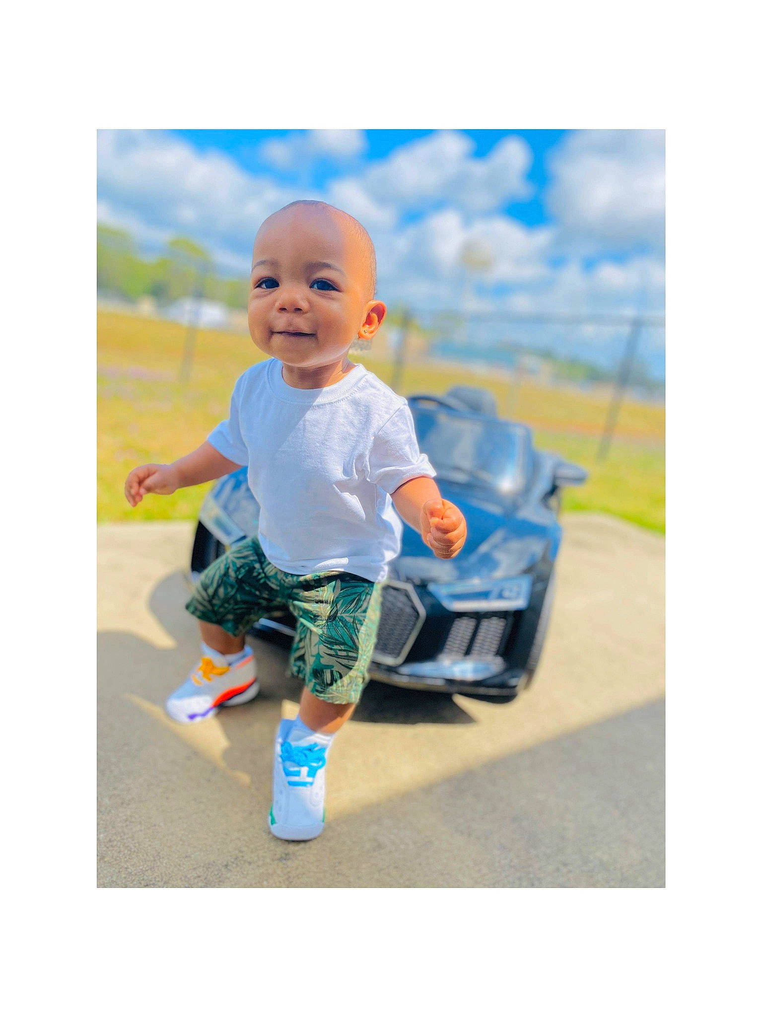 Jewel is registered to the contest to win money with this photo: baby, child, person, play, playset, product, sitting, toddler, toy, turquoise, vehicle