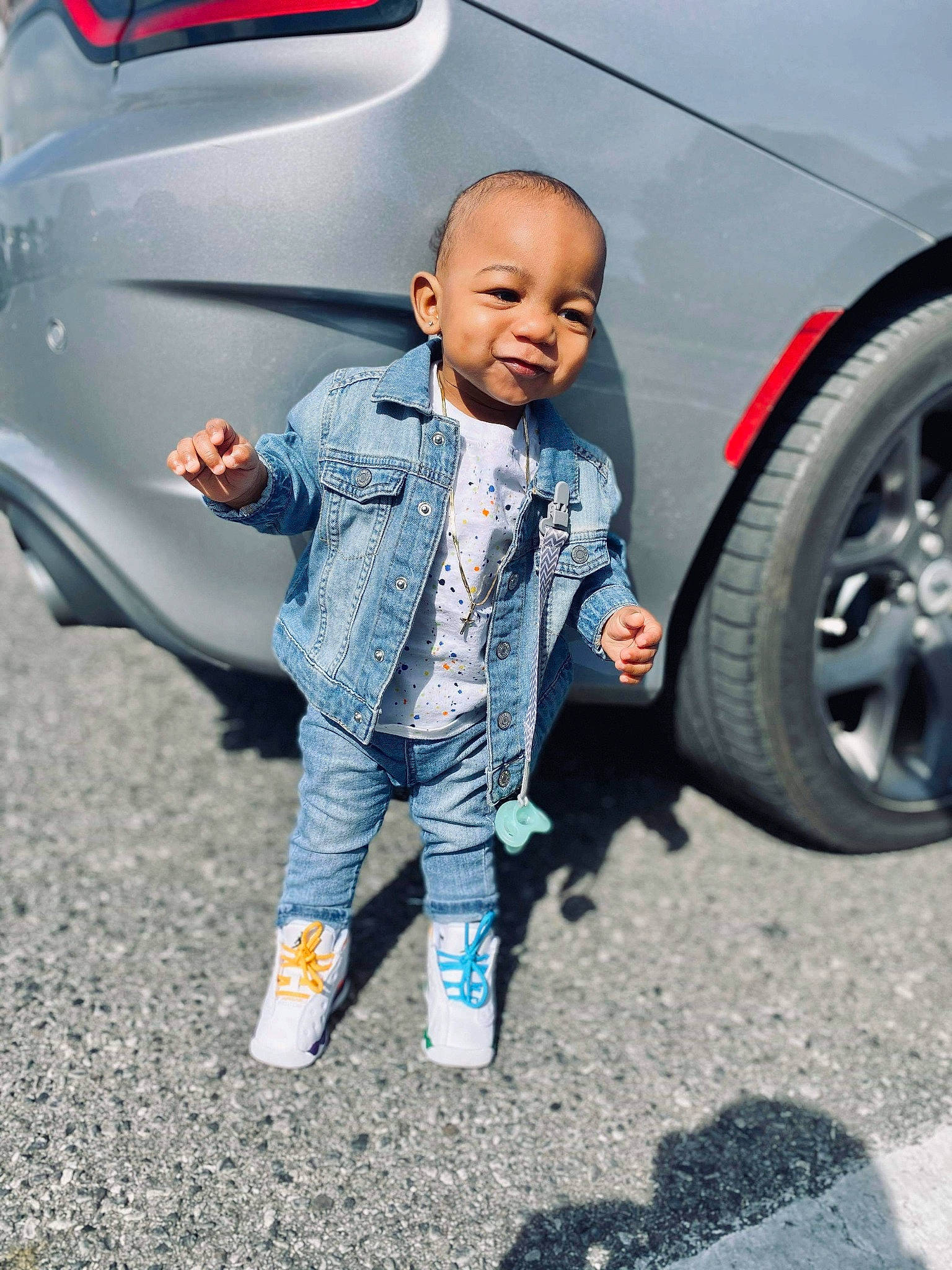 Jewel joined the competition — help win amazing prizes! auto_part, automotive_tire, automotive_wheel_system, baby, car, child, city_car, family_car, gesture, jeans, person, rim, smile, subcompact_car, tire, toddler, vehicle, vehicle_door, wheel