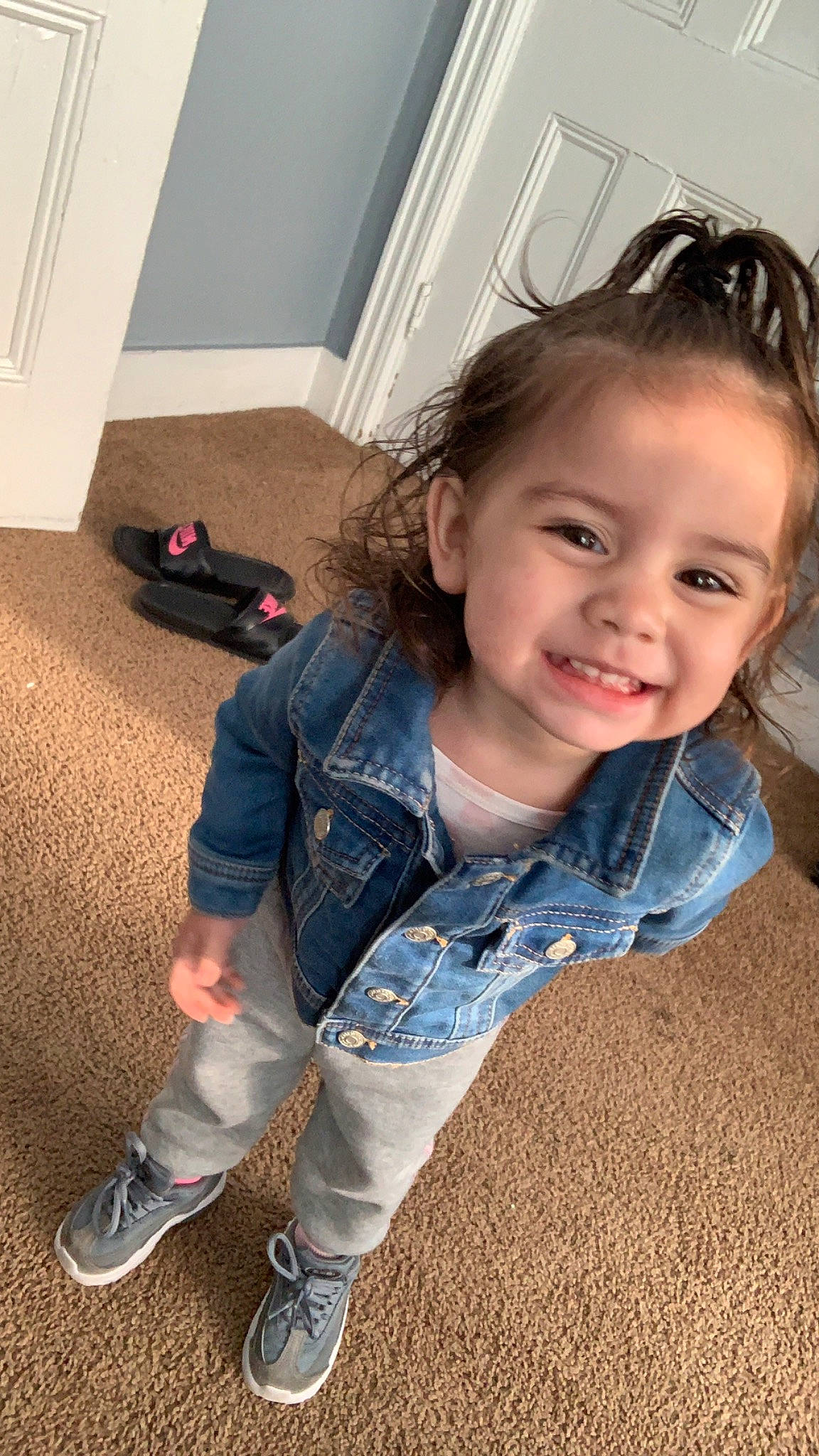 Aliviana is registered to the contest to win money with this photo: cheek, child, child_model, cool, denim, facial_expression, floor, flooring, footwear, fun, jeans, joy, leg, long_hair, person, photography, play, shoe, sitting, skin