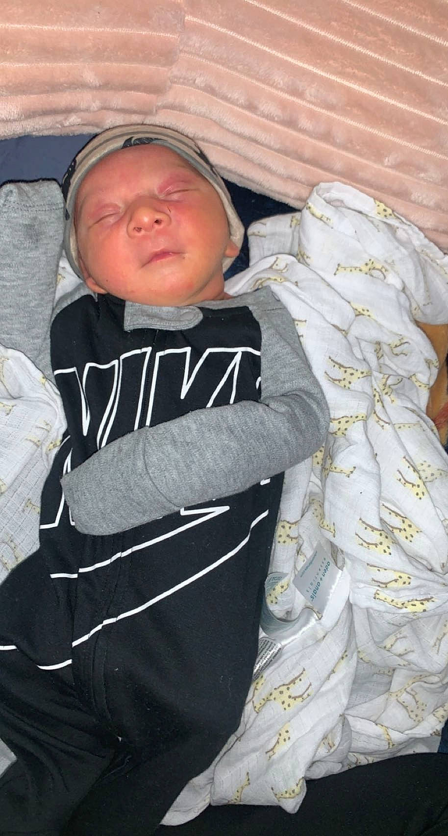 Diallo joined the competition — help win amazing prizes! baby, baby_products, baby_toddler_clothing, cap, cheek, child, comfort, face, happy, head, headwear, hood, hoodie, linens, pattern, person, sitting, sleeve, t_shirt, toddler