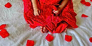 Kaia joined the competition — help win amazing prizes! baby, bed, blanket, clothing, dress, face, flower, formalwear, furniture, happy, hat, head, person, petal, photography, plant, portrait, quilt, sitting, smile