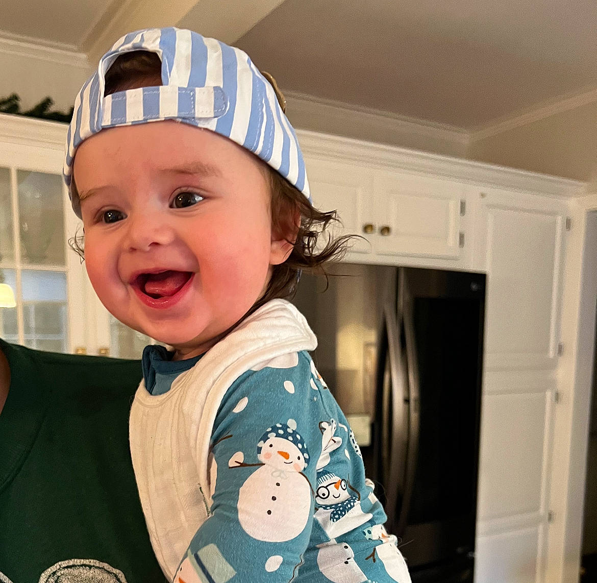Louis joined the competition — help win amazing prizes! baby, baby_toddler_clothing, bib, cap, child, cool, door, facial_expression, fashion_accessory, fun, hairstyle, happy, headwear, helmet, mammal, people, person, product, sleeve, smile