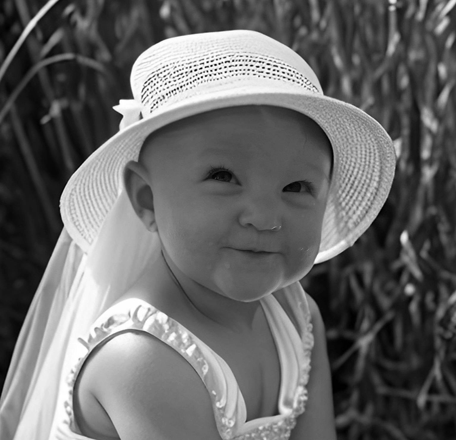 Sadie Mae joined the competition — help win amazing prizes! black, black_and_white, cap, clothing, eye, facial_expression, happy, hat, headgear, headwear, human_body, lip, mammal, organ, people_in_nature, person, photograph, plant, smile, style