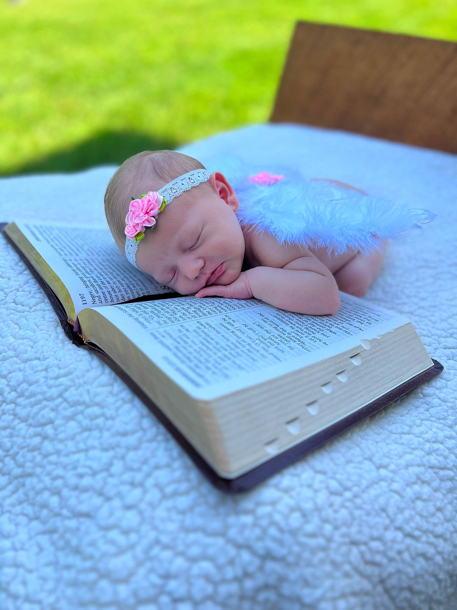 Sadie is registered to the contest to win money with this photo: azure, baby, baby_toddler_clothing, cap, child, comfort, electronic_device, facial_expression, fashion_accessory, finger, gadget, hand, headwear, leisure, netbook, person, plant, product, purple, reading