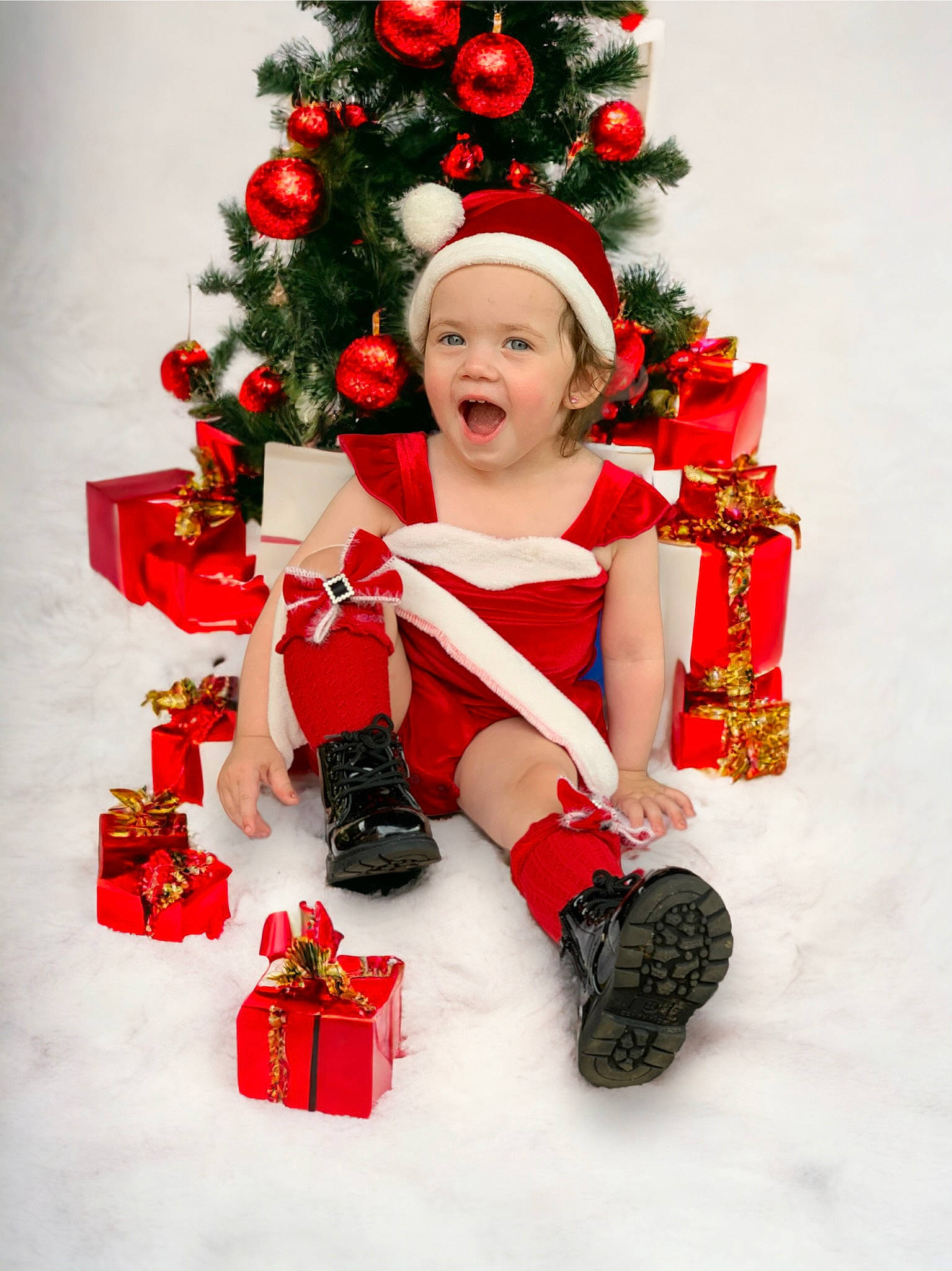 Harper joined the competition — help win amazing prizes! carmine, christmas, christmas_decoration, christmas_ornament, christmas_tree, conifer, costume_hat, event, evergreen, happy, hat, headwear, holiday, holiday_ornament, ornament, person, plant, red, santa_claus, smile