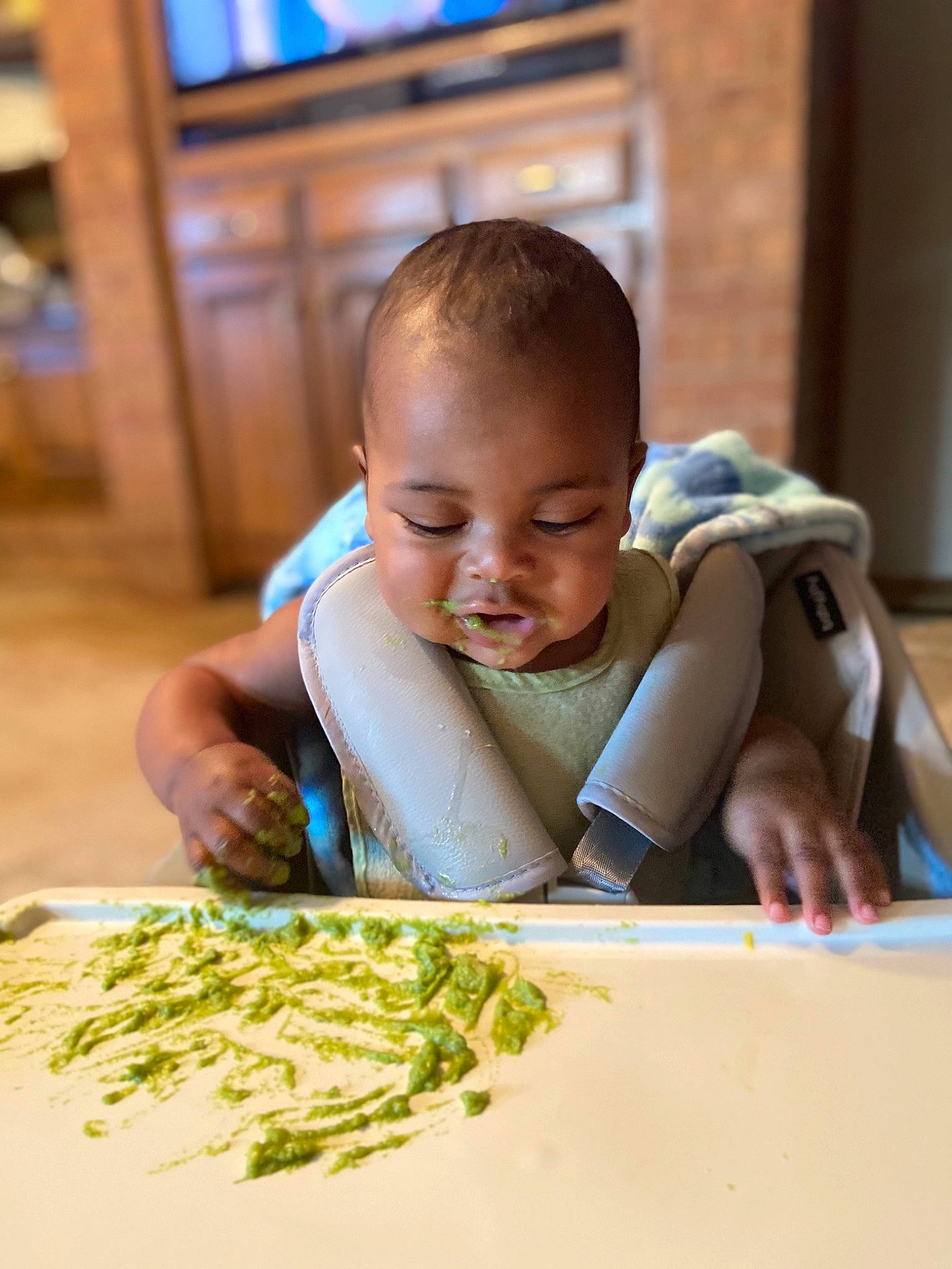 Josiah joined the competition — help win amazing prizes! baby, baby_toddler_clothing, child, comfort_food, cuisine, flooring, food, fun, happy, hardwood, ingredient, leaf_vegetable, person, recipe, smile, t_shirt, tableware, television, toddler, vegetable