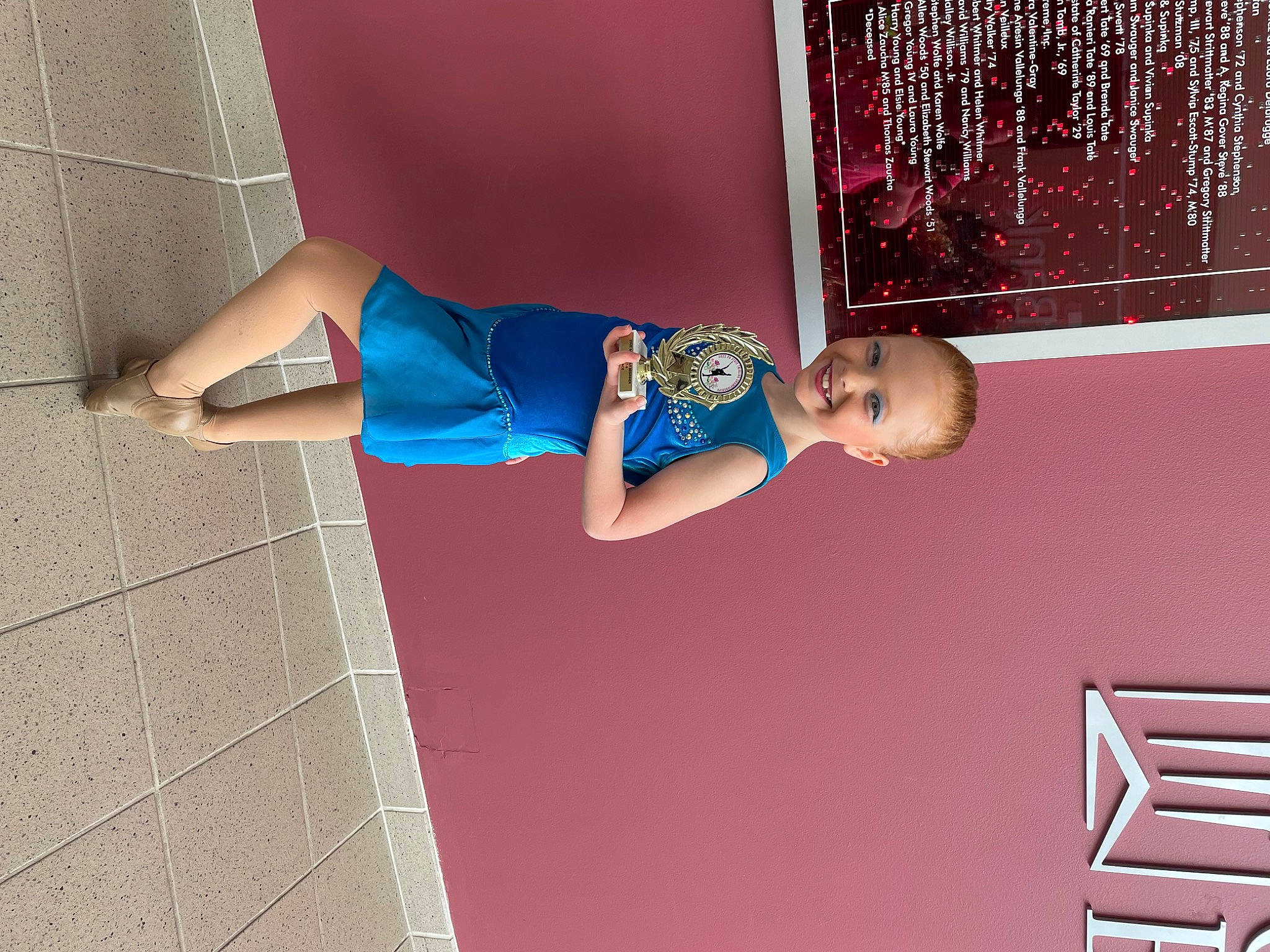 Kayla Kriner is registered to the contest to win money with this photo: baby_toddler_clothing, child, dress, elbow, electric_blue, flooring, fun, human_leg, joy, knee, leisure, magenta, person, pink, room, smile, stairs, t_shirt, thigh, toddler