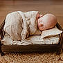 Kashton Smith joined the competition — help win amazing prizes! newborn, baby, sleeping, blanket, wooden_bed, pillow, rug, cozy, wrapped, infant, soft, peaceful, indoor, floor, cushion, portrait, child, cute, resting, knit