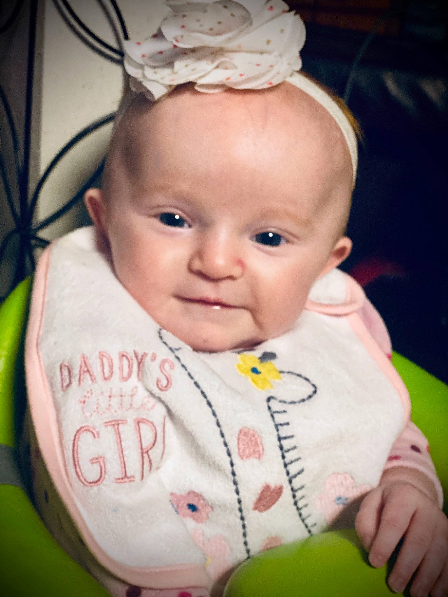 Gabriella is registered to the contest to win money with this photo: baby, baby_toddler_clothing, cheek, chin, ear, eyebrow, eyelash, face, facial_expression, happy, head, iris, leaf, lip, mammal, nose, person, skin, sleeve, textile