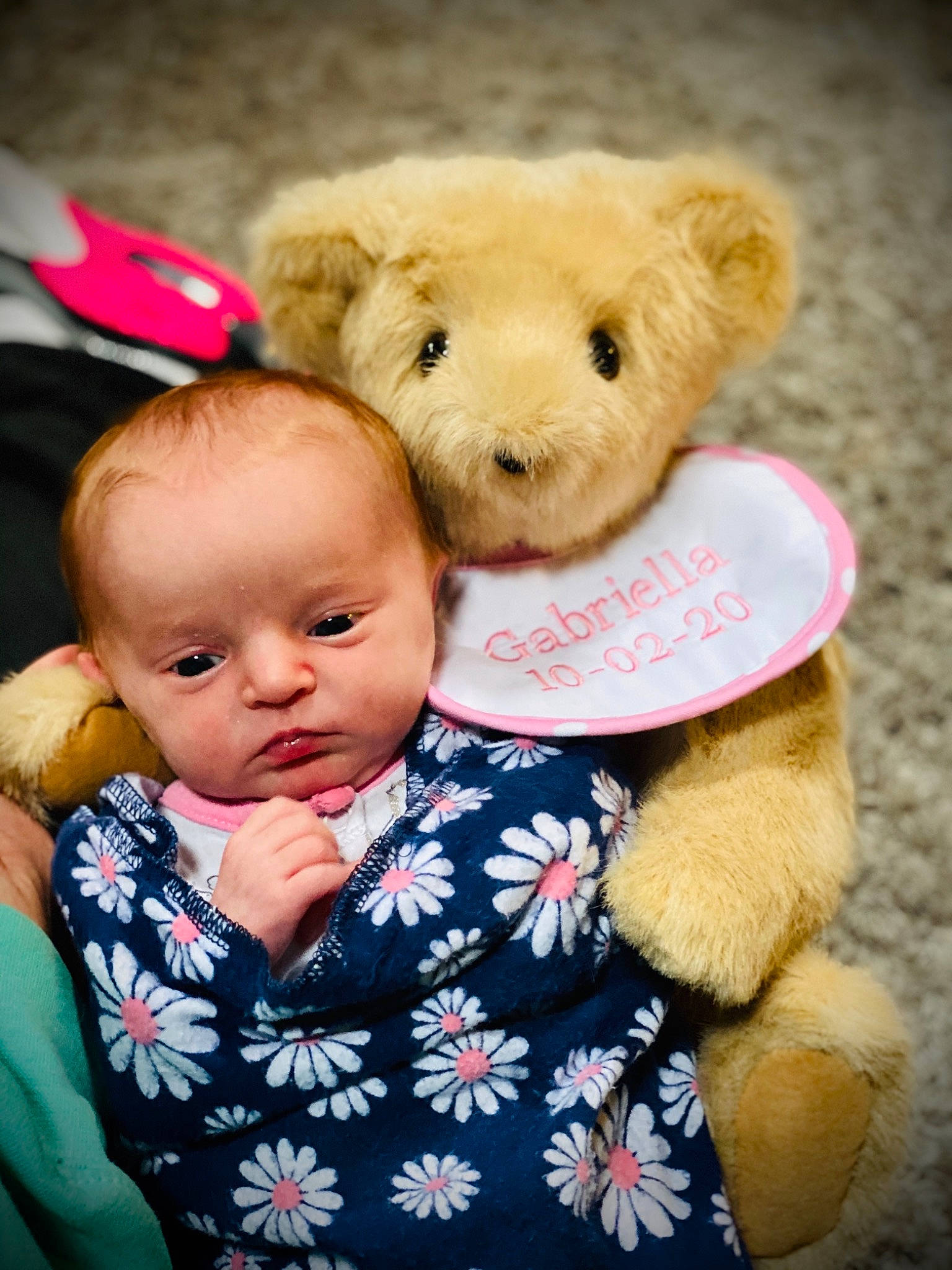 Gabriella is registered to the contest to win money with this photo: baby, baby_toddler_clothing, beauty, cheek, comfort, facial_expression, happy, head, human_body, mammal, nose, person, pink, product, skin, teddy_bear, textile, toddler, toy, white