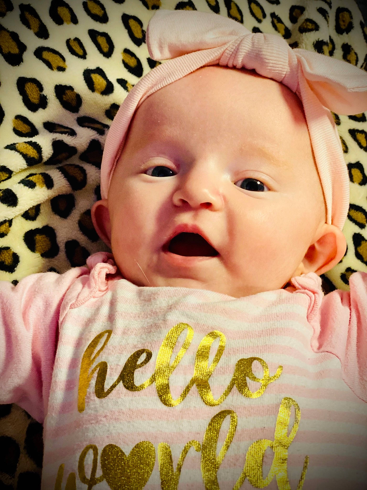 Gabriella is registered to the contest to win money with this photo: baby, baby_toddler_clothing, cheek, child, chin, cool, eyebrow, face, happy, head, iris, lip, nose, person, pink, skin, sleeve, smile, textile, toddler