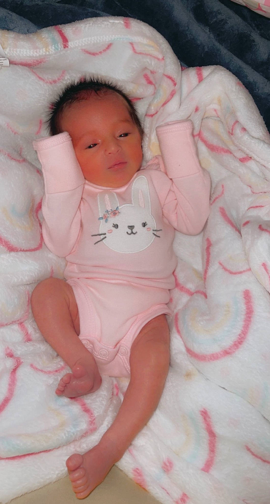 Kamiya is registered to the contest to win money with this photo: arm, baby, baby_toddler_clothing, cheek, comfort, dress, eye, face, happy, head, human_leg, linens, lip, magenta, pattern, person, pink, sitting, skin, sleeve