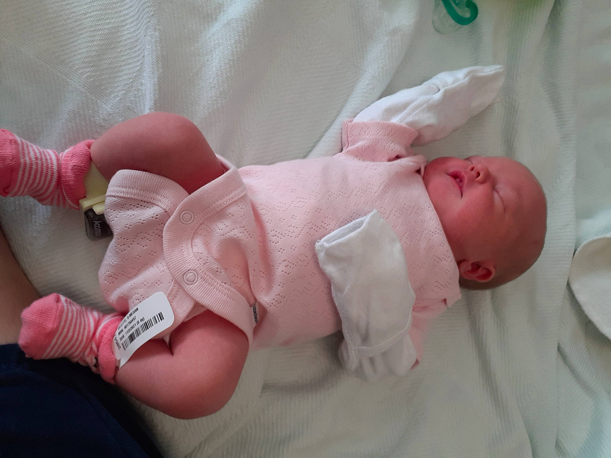 Kahli Ann is registered to the contest to win money with this photo: arm, baby, baby_products, baby_toddler_clothing, cheek, child, comfort, finger, hand, head, human_body, leg, linens, nail, person, pink, product, skin, textile, thumb