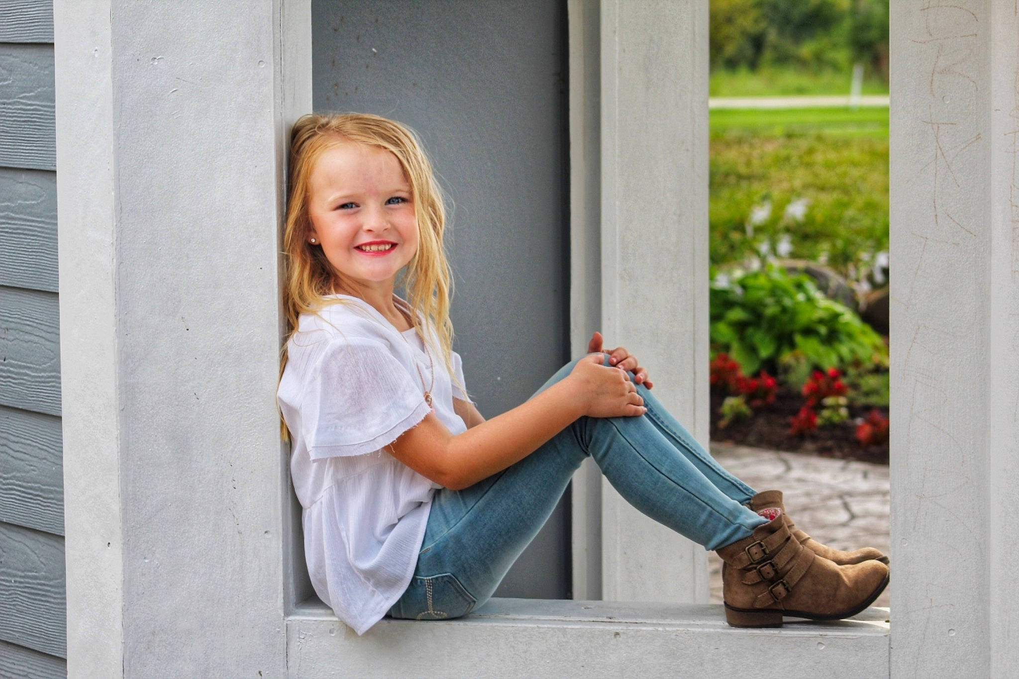 Autumn is registered to the contest to win money with this photo: ankle, blond, boot, child, child_model, cowboy_boot, door, footwear, jeans, joy, leg, person, photograph, photography, portrait, portrait_photography, shoe, sitting, textile, toddler