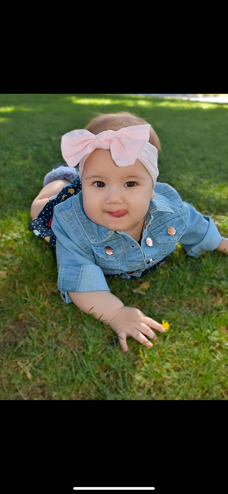 Evelyn is registered to the contest to win money with this photo: accessories, baby, clothing, coat, face, field, grass, hat, head, jacket, jeans, lawn, nature, outdoors, pants, park, person, photography, plant, portrait