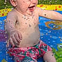River joined the competition — help win amazing prizes! baby, bare_chest, child, cute, droplets, fun, grass, happy, joy, outdoor, play, pool, shorts, sitting, skin, smiling, splash, summer, sunlight, water