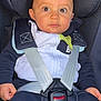 Fayver a rejoint le concours — aidez-le/la à gagner de superbes lots ! baby, child, car_seat, safety_harness, clothing, hoodie, pants, seatbelt, infant, person, portrait, indoors, cute, baby_face, seated, child_safety, car_interior, baby_boy, secure, young_child