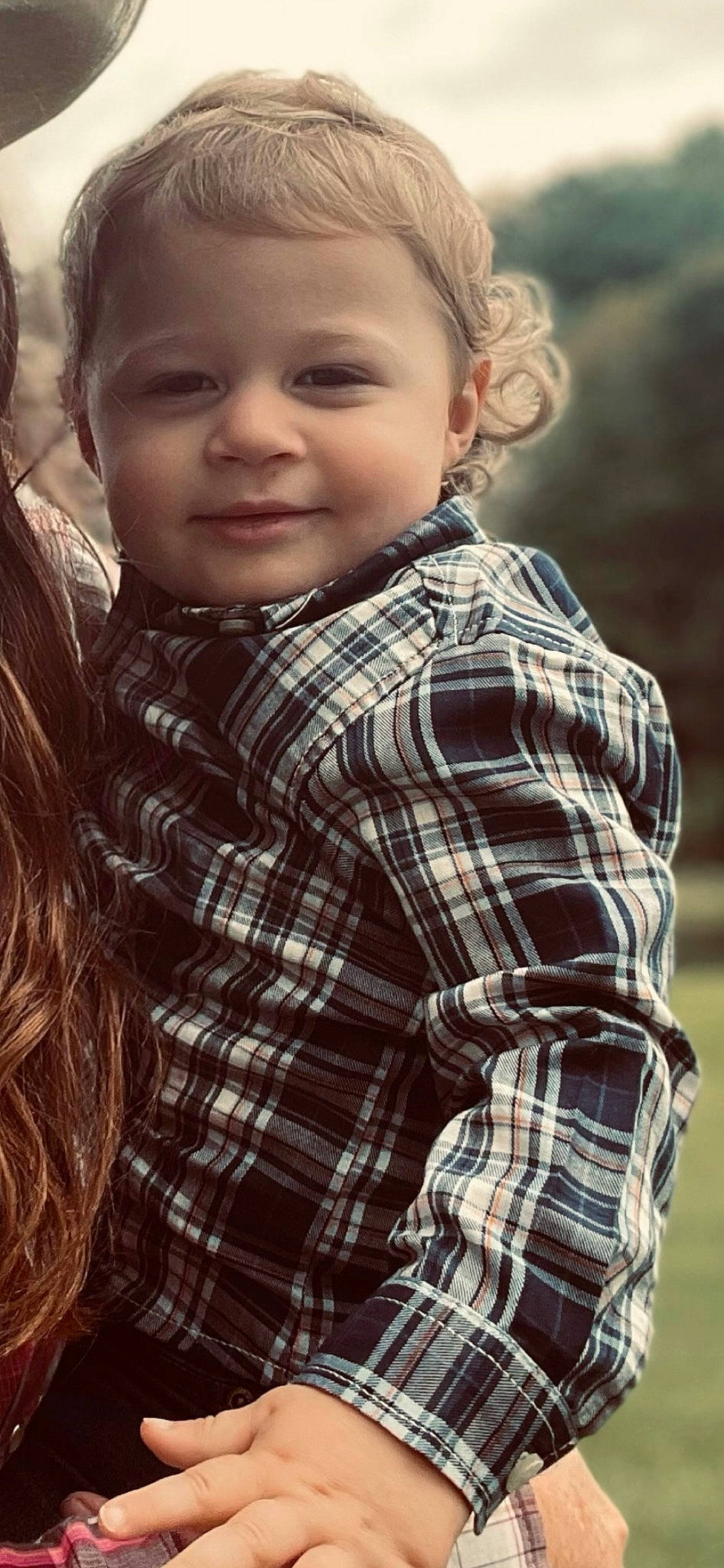 Nathaniel Aka Bry Bry is registered to the contest to win money with this photo: cheek, child, chin, collar, dress_shirt, flash_photography, grass, happy, human, iris, joy, light, lip, pattern, people_in_nature, person, plaid, sleeve, smile, tartan