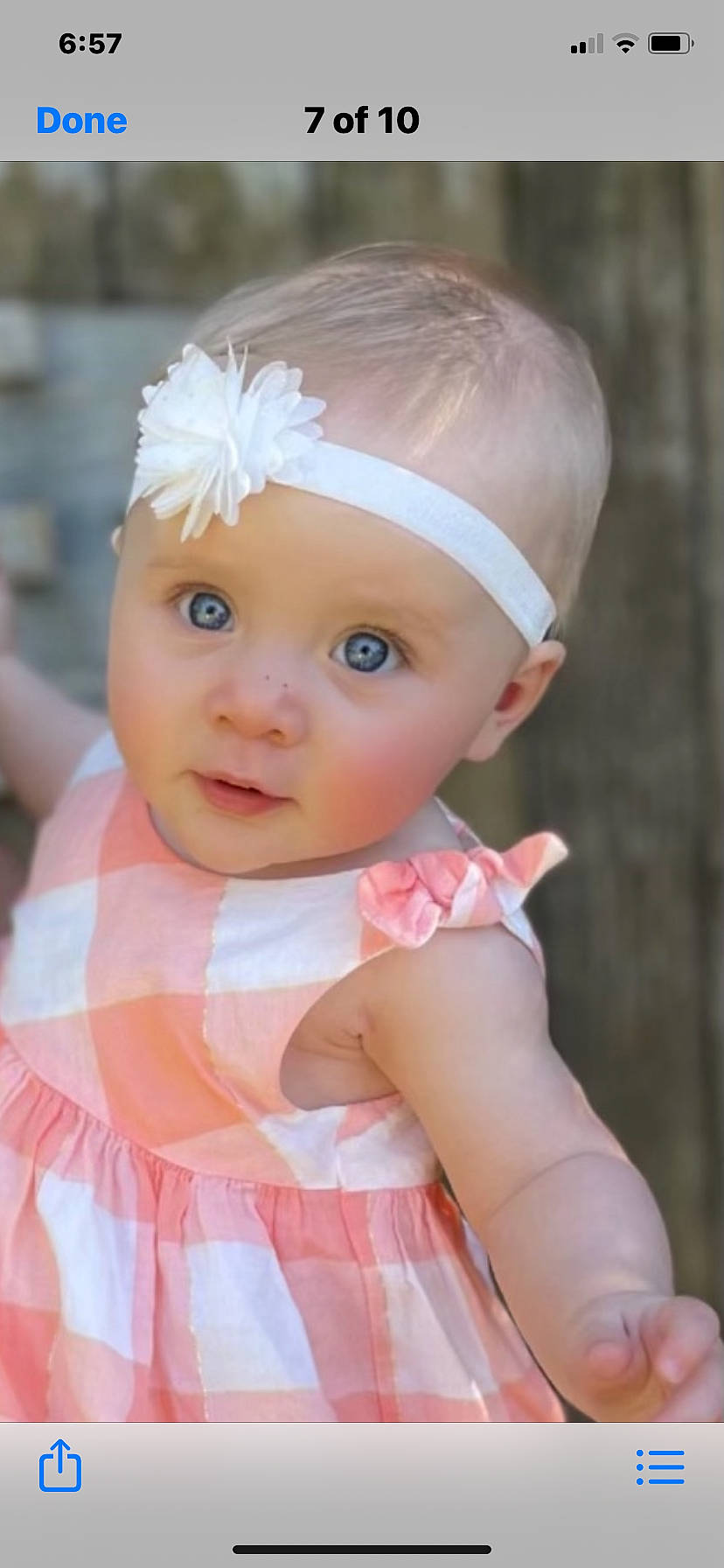 Lainey joined the competition — help win amazing prizes! baby, baby_toddler_clothing, cheek, close_up, clothing, dress, eye, eyelash, facial_expression, fun, grass, happy, headband, headgear, headpiece, headwear, iris, lip, person, pink