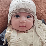 Ava participe au concours pour gagner de l'argent avec cette photo : baby, infant, child, hat, knit_hat, clothing, portrait, face, eyes, cute, warm, cozy, soft, indoors, closeup, expression, person, baby_clothes, headwear, newborn