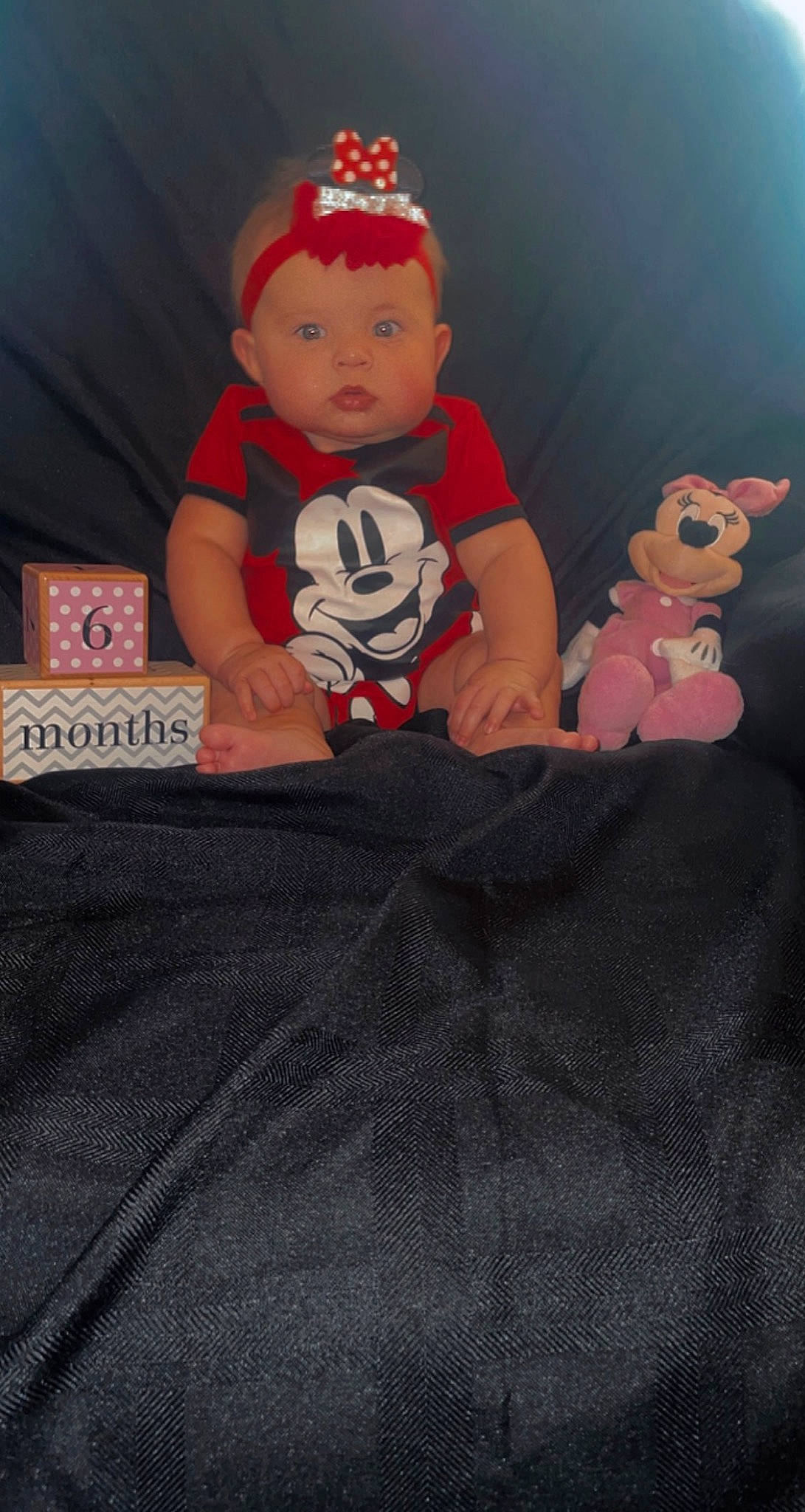 Hazley Conrad is registered to the contest to win money with this photo: baby, baby_toddler_clothing, cap, carmine, child, costume_hat, event, fictional_character, happy, linens, mario, person, pink, room, sitting, sleeve, stuffed_toy, t_shirt, teddy_bear, toddler