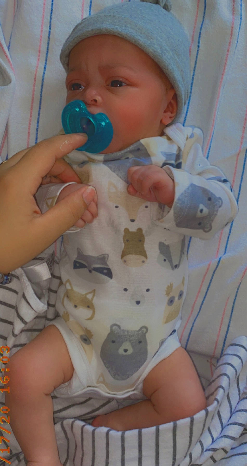 Cahlani is registered to the contest to win money with this photo: baby, baby_products, baby_safety, baby_toddler_clothing, beanie, bonnet, child, knit_cap, nail, person, plastic, product, toddler