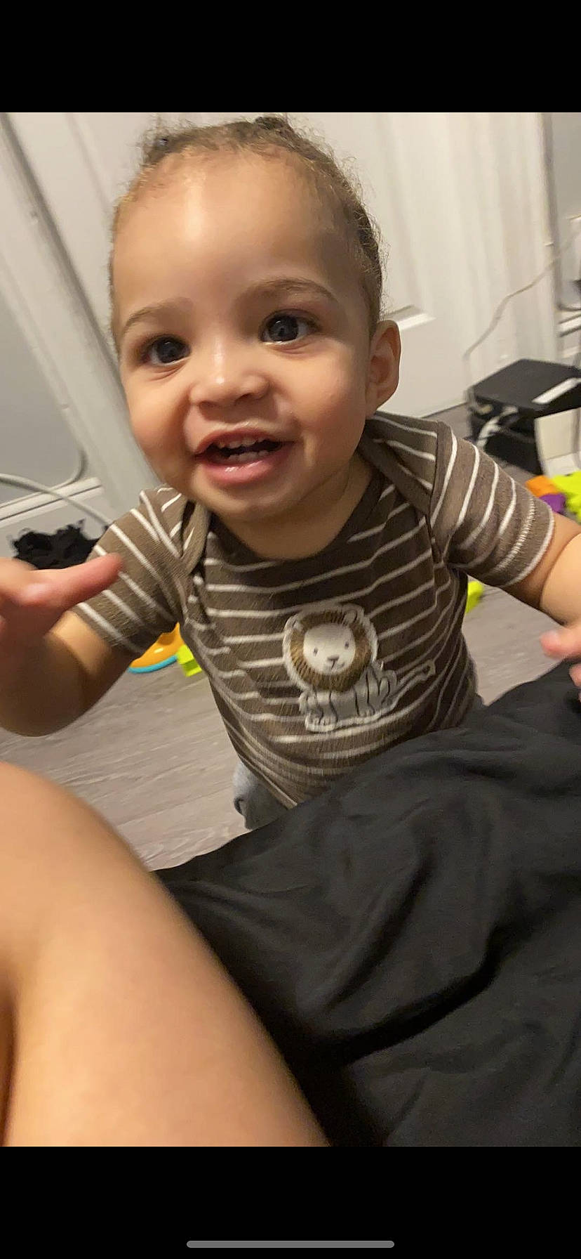 Cleo is registered to the contest to win money with this photo: arm, baby, baby_grabbing_for_something, baby_laughing, baby_products, baby_toddler_clothing, cheek, child, finger, hand, laugh, mobile_phone, nail, person, skin, thumb, toddler