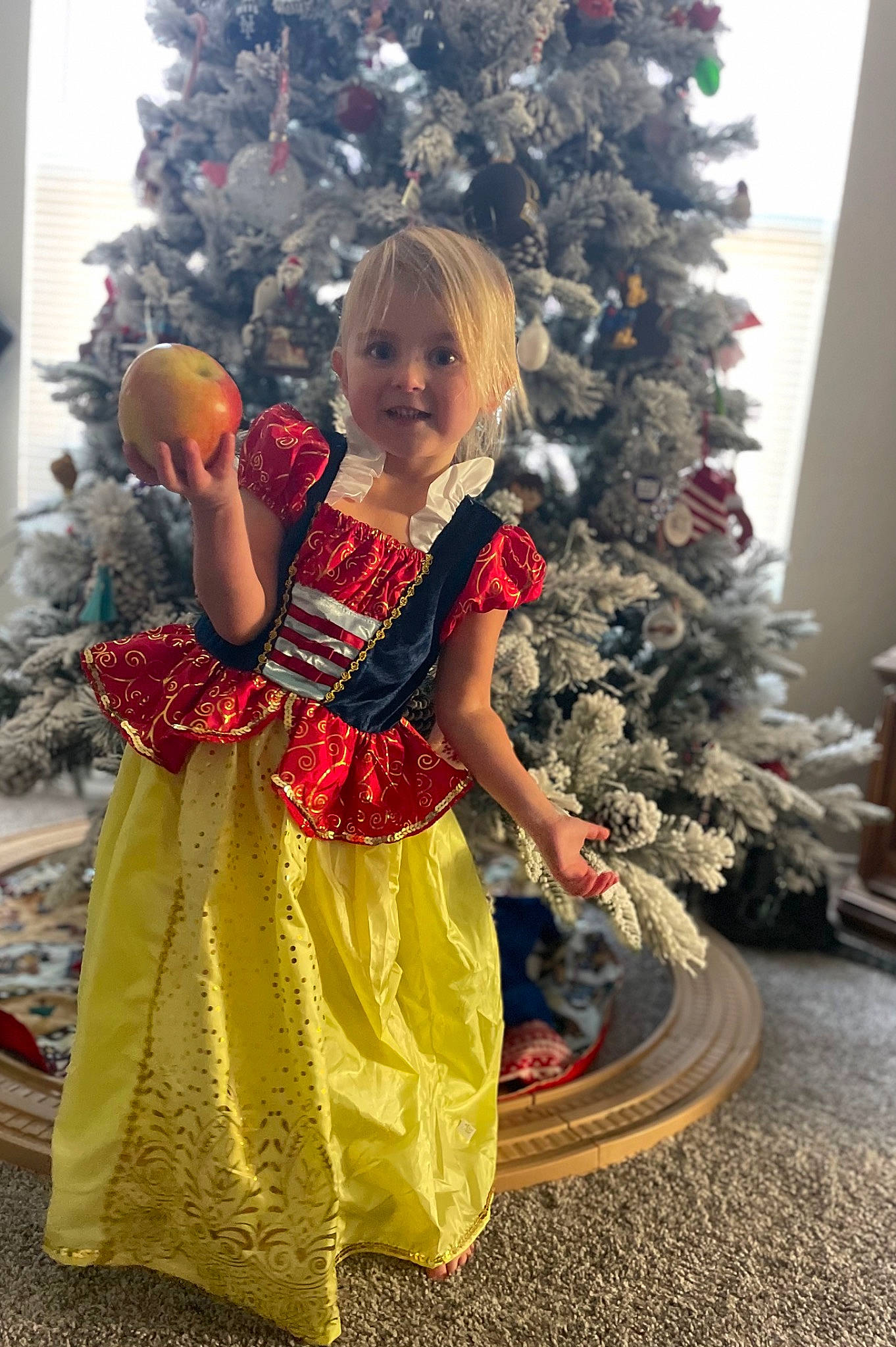 Kaydence joined the competition — help win amazing prizes! blond, christmas, christmas_decoration, christmas_eve, christmas_ornament, christmas_tree, conifer, dress, event, evergreen, fashion_design, fun, happy, holiday, holiday_ornament, joy, ornament, person, plant, toddler