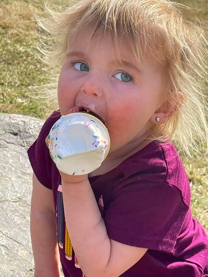 Kaydence is registered to the contest to win money with this photo: baby_toddler_clothing, clothing, drinkware, eyelash, face, fun, grass, happy, head, lip, mouth, nose, people, people_in_nature, person, plastic_bottle, skin, summer, sunlight, toddler