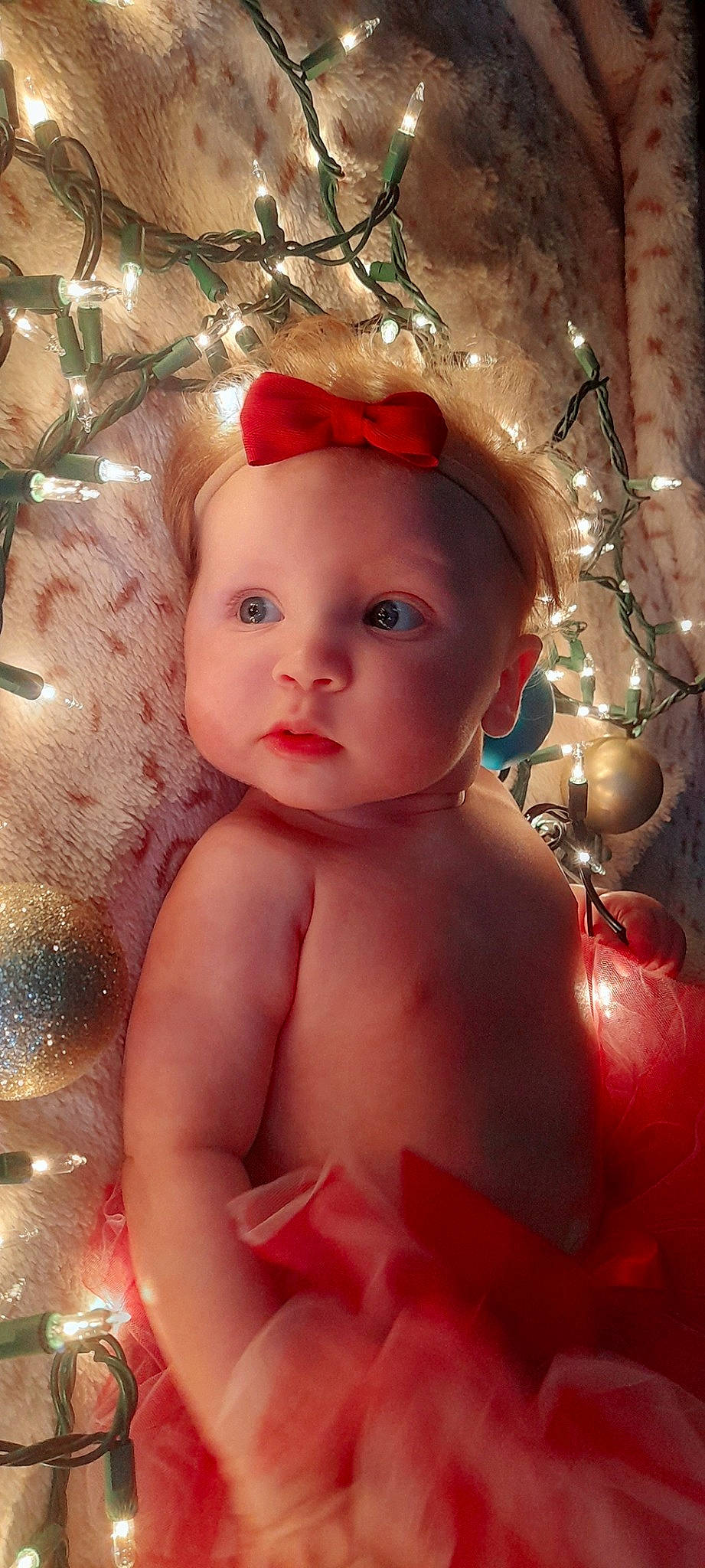 Layne joined the competition — help win amazing prizes! baby, cap, cheek, chest, child, christmas_ornament, close_up, costume_hat, doll, eyebrow, eyelash, headpiece, human_body, jewellery, lip, ornament, person, pink, skin, toddler