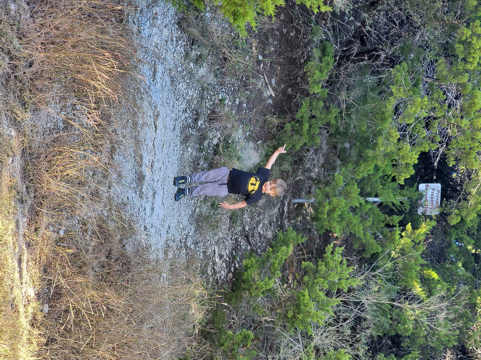 Garrett joined the competition — help win amazing prizes! adventure, bedrock, forest, geological_phenomenon, grass, grassland, joy, jungle, landscape, person, plant, recreation, rock, soil, terrain, tire, tree, trunk, water, watercourse