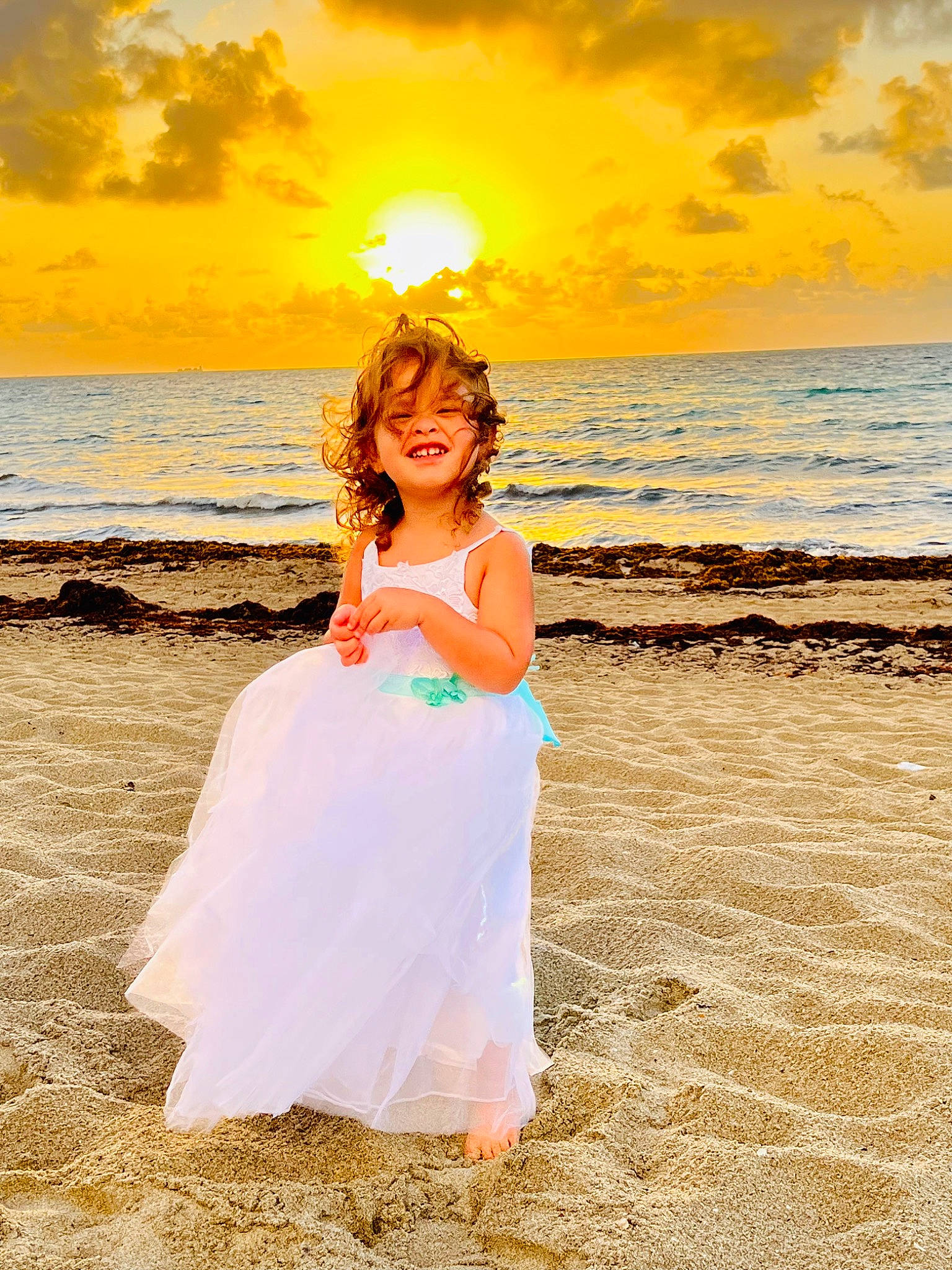 Mac joined the competition — help win amazing prizes! azure, beach, body_of_water, cloud, coastal_and_oceanic_landforms, dress, flash_photography, gesture, gown, hair, happy, light, natural_environment, nature, people_in_nature, people_on_beach, person, sky, sunlight, water