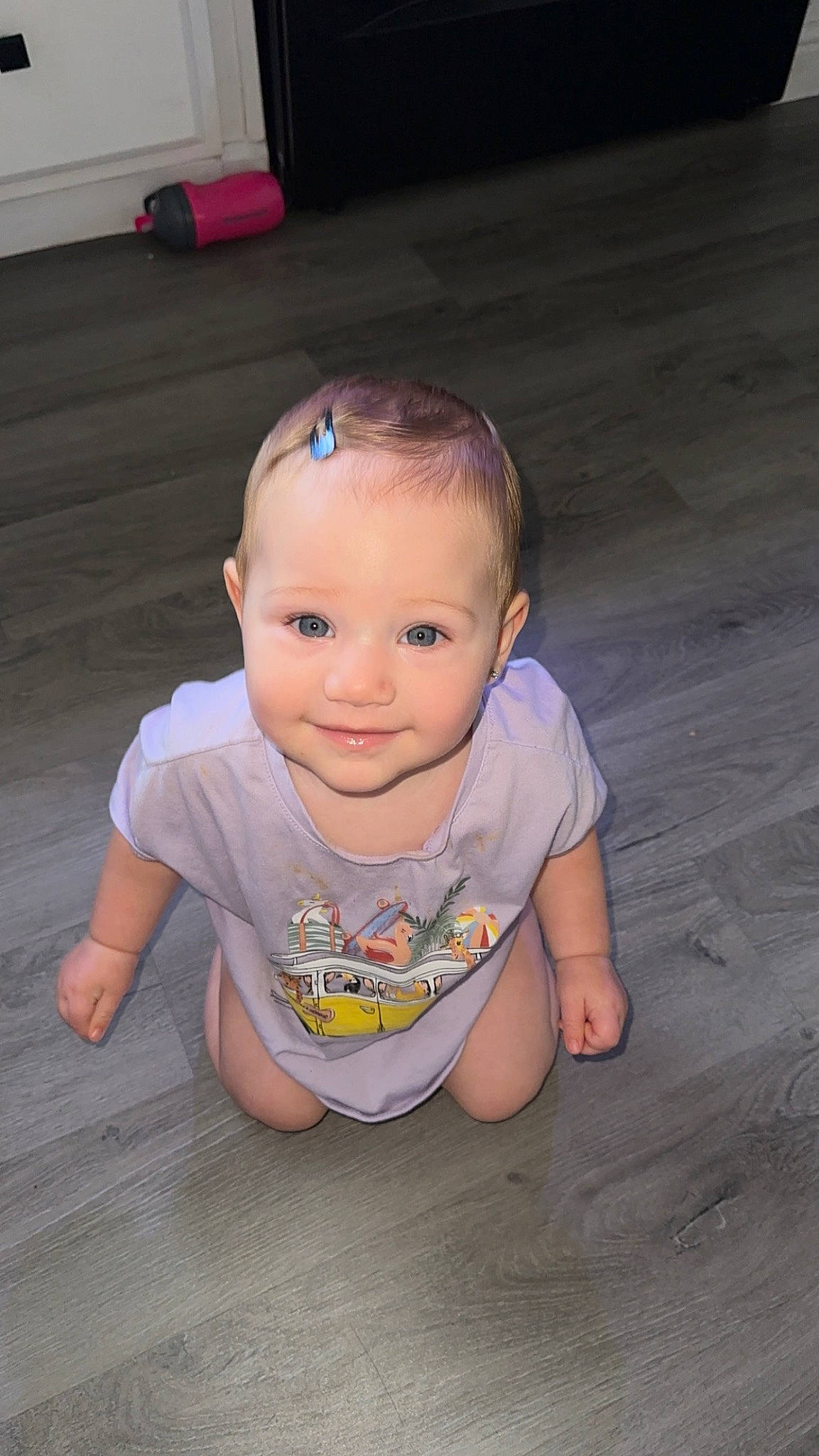 Emerleigh joined the competition — help win amazing prizes! baby, baby_toddler_clothing, cheek, child, crawling, flash_photography, floor, flooring, fun, grass, happy, hardwood, joy, pattern, person, sitting, skin, smile, t_shirt, toddler