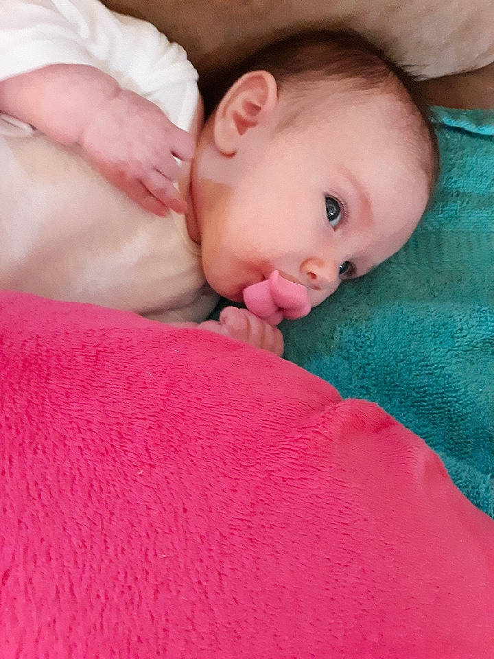 Ryan is registered to the contest to win money with this photo: baby, bedtime, cheek, child, close_up, eye, face, finger, hand, head, lip, mouth, muscle, nap, neck, nose, person, pink, skin, thumb