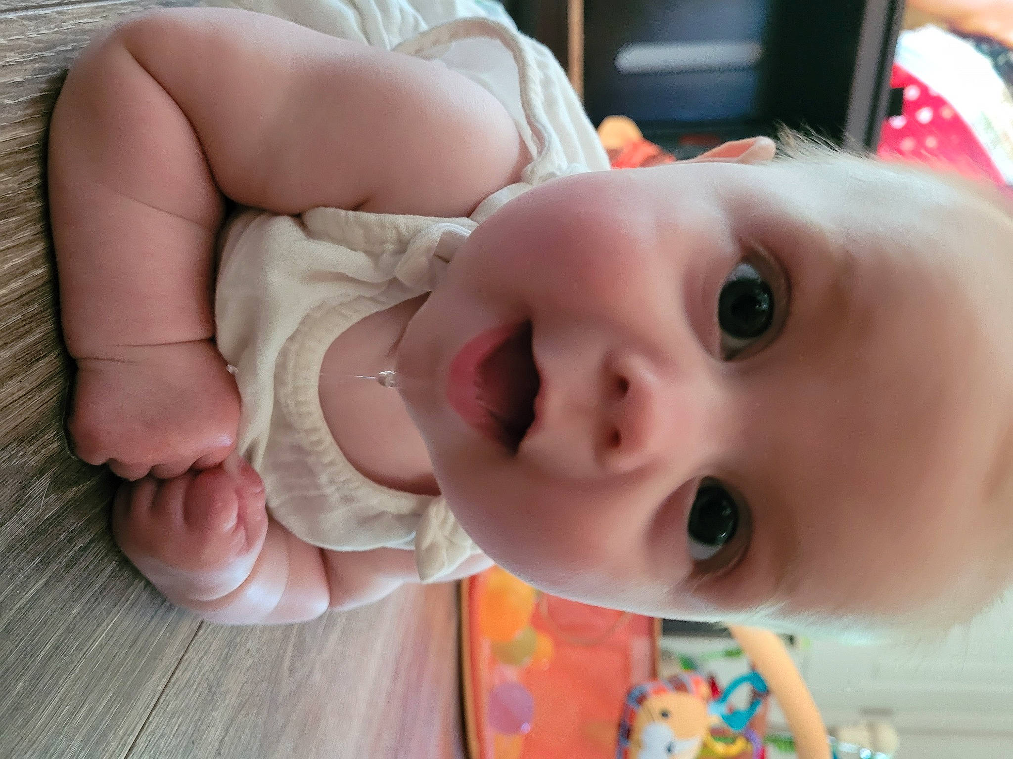 Emmalynn is registered to the contest to win money with this photo: baby, baby_toddler_clothing, cheek, chin, ear, eye, eyebrow, eyelash, finger, happy, human_body, iris, lip, mouth, neck, nose, person, skin, smile, surprise