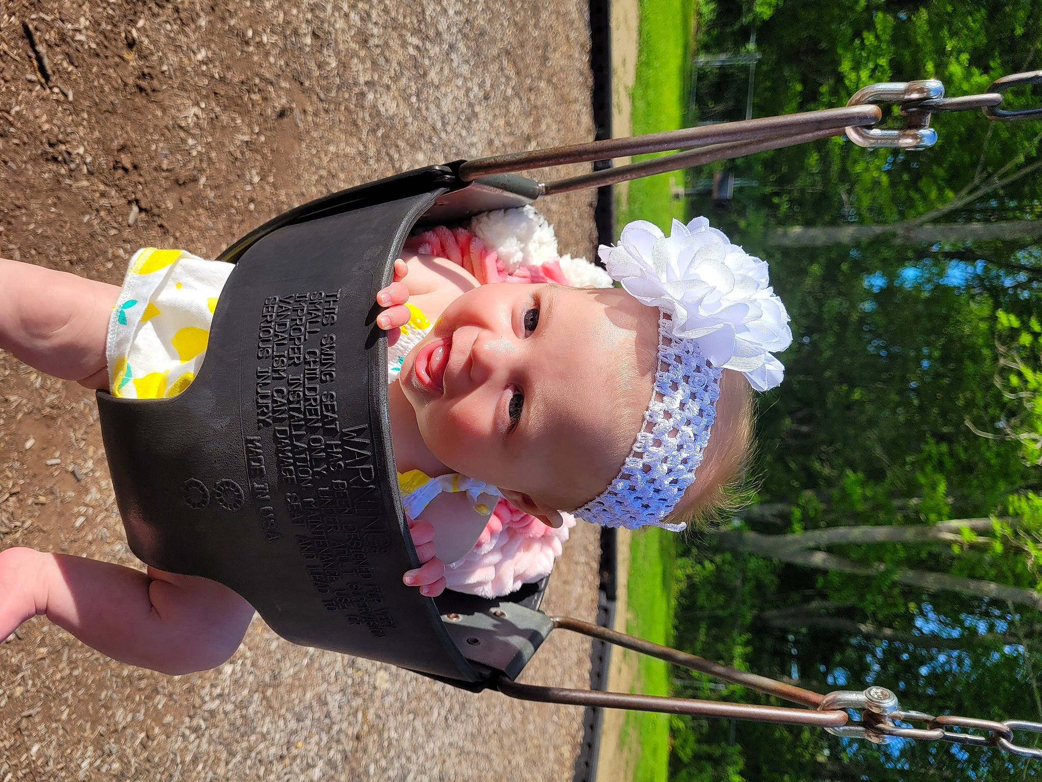 Emmalynn joined the competition — help win amazing prizes! child, eye, eyewear, fun, grass, happy, leisure, outdoor_play_equipment, person, pink, plant, play, public_space, recreation, smile, summer, toddler, tree, vacation, water