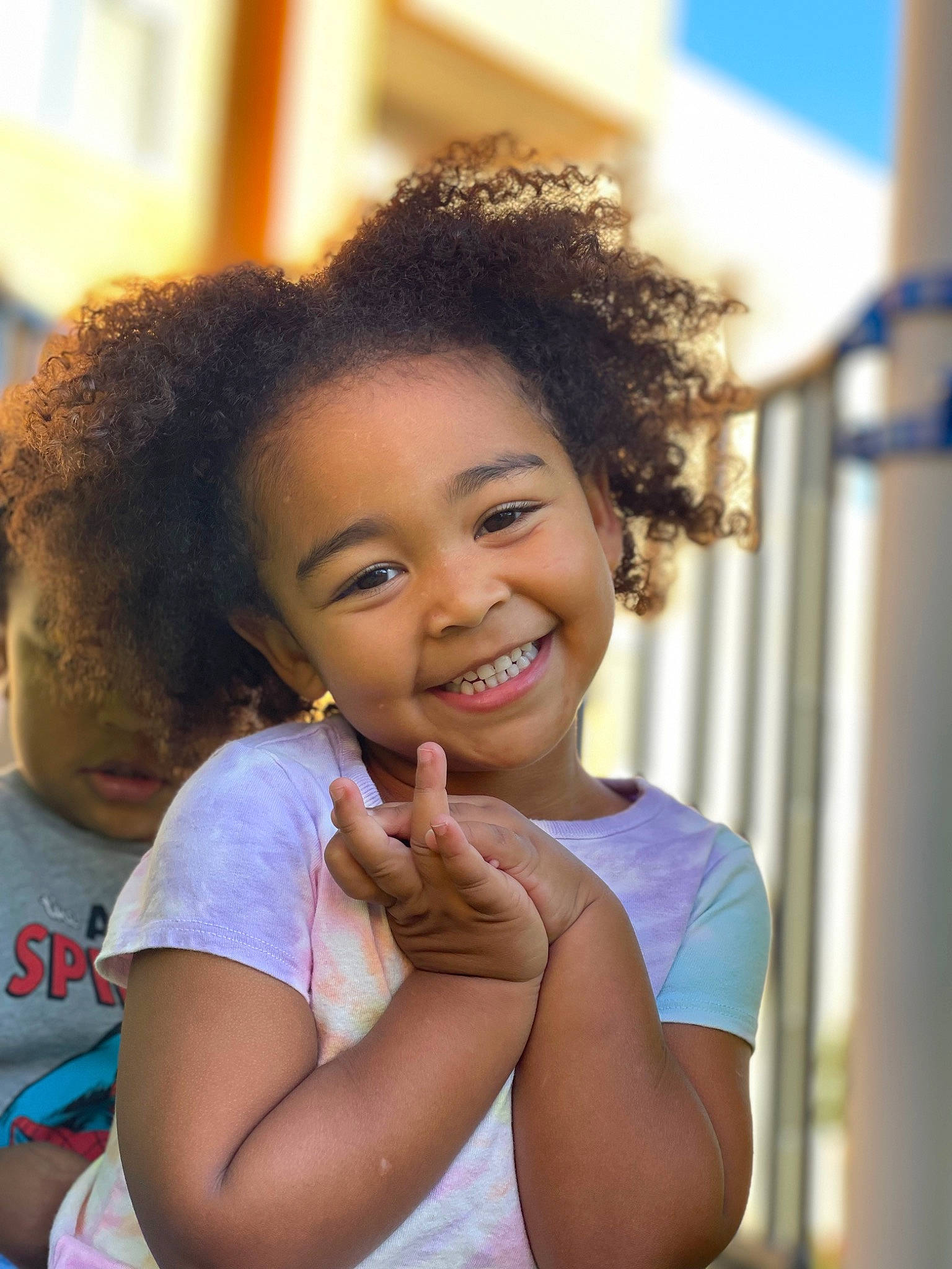 Myla is registered to the contest to win money with this photo: afro, arm, black_hair, blue, child, event, eyebrow, face, flash_photography, fun, gesture, happy, jheri_curl, joy, leisure, lip, long_hair, person, shoulder, skin