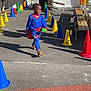 Ayden participe au concours pour gagner de l'argent avec cette photo : child, superhero_costume, traffic_cones, outdoor, playground, running, costume, unicorn, party, celebration, people, adult, bench, door, sunlight, shadow, fun, game, school, play