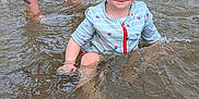 Adalyn joined the competition — help win amazing prizes! beach, child, cute, fun, happy, legs, nature, outdoor, pattern, person, playing, sand, sitting, splashing, summer, swimsuit, tattoo, toddler, water, waves