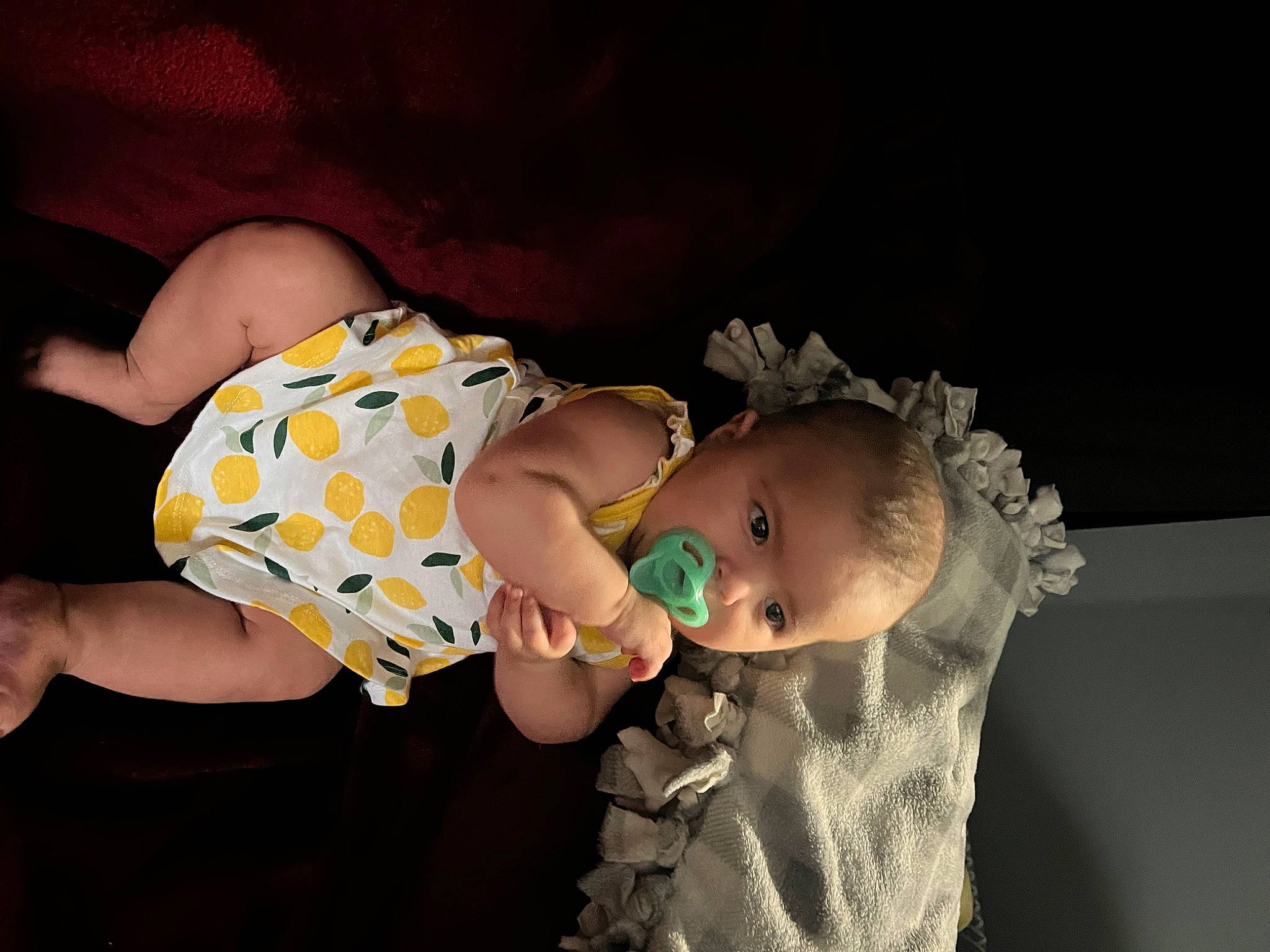 Everleigh is registered to the contest to win money with this photo: abdomen, baby, baby_toddler_clothing, cheek, child, comfort, event, flash_photography, fun, happy, human_body, human_leg, interaction, mouth, pattern, person, sitting, skin, thigh, toddler