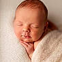 newborn, baby, sleeping, blanket, soft_texture, closeup, peaceful, infant, wrapped, portrait, cozy, cute, resting, skin, face, hand, warm, comfort, indoors, gentle_light
